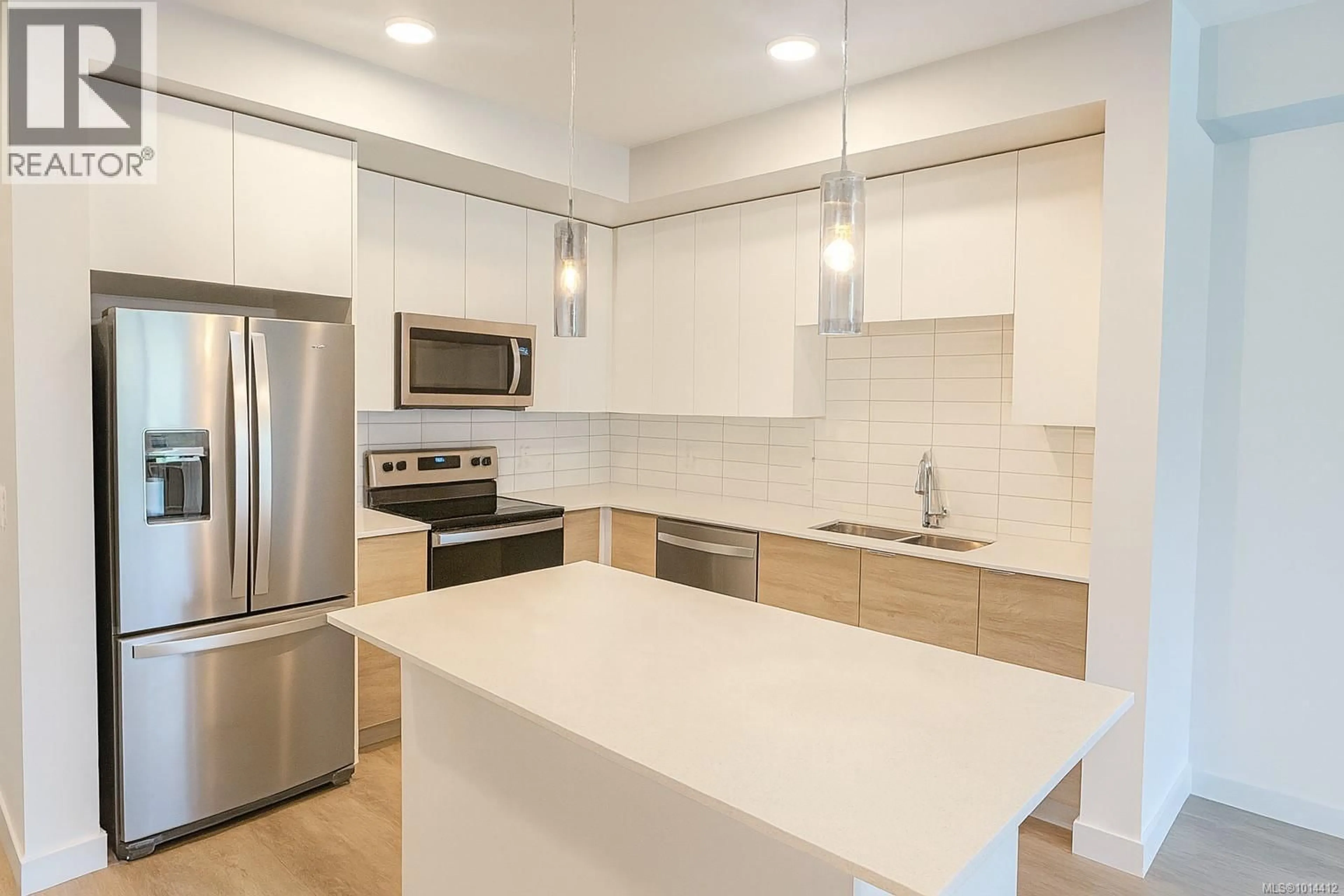 Open concept kitchen, ceramic/tile floor for 218 - 4830 CEDAR RIDGE PLACE, Nanaimo British Columbia V9T0M8