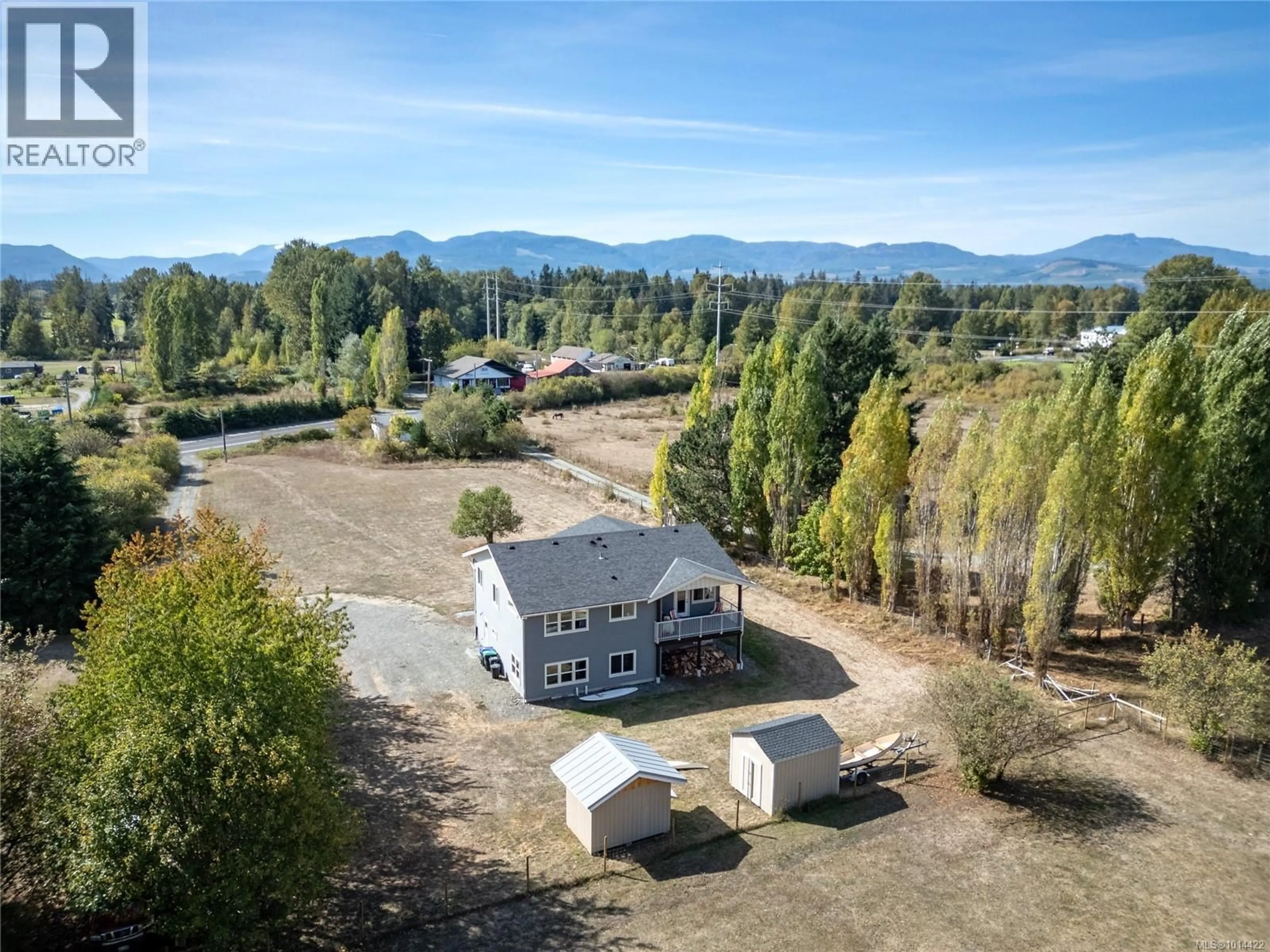 A pic from outside/outdoor area/front of a property/back of a property/a pic from drone, mountain view for 4754 HEADQUARTERS ROAD, Courtenay British Columbia V9N9H4