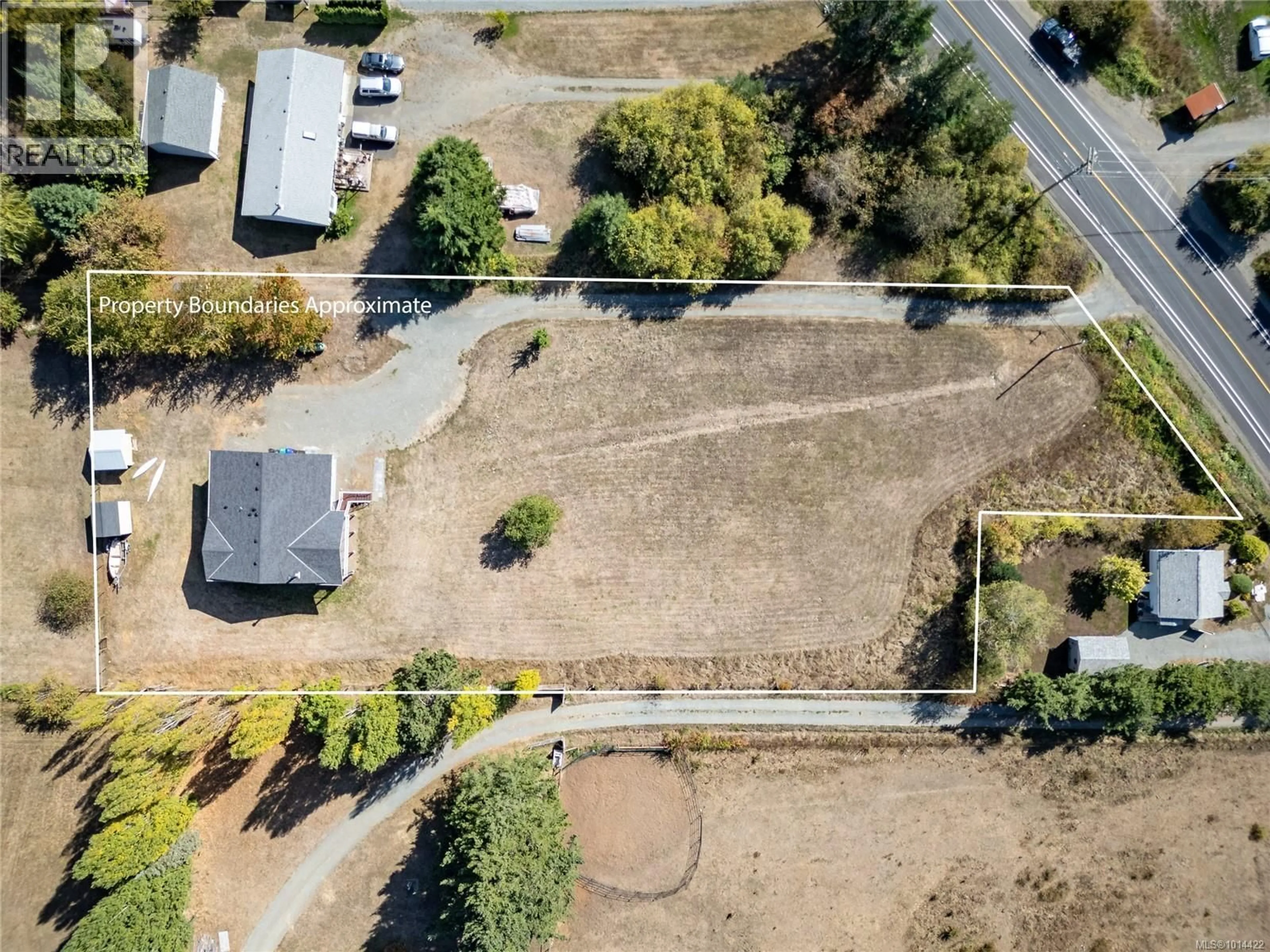 A pic from outside/outdoor area/front of a property/back of a property/a pic from drone, street for 4754 HEADQUARTERS ROAD, Courtenay British Columbia V9N9H4
