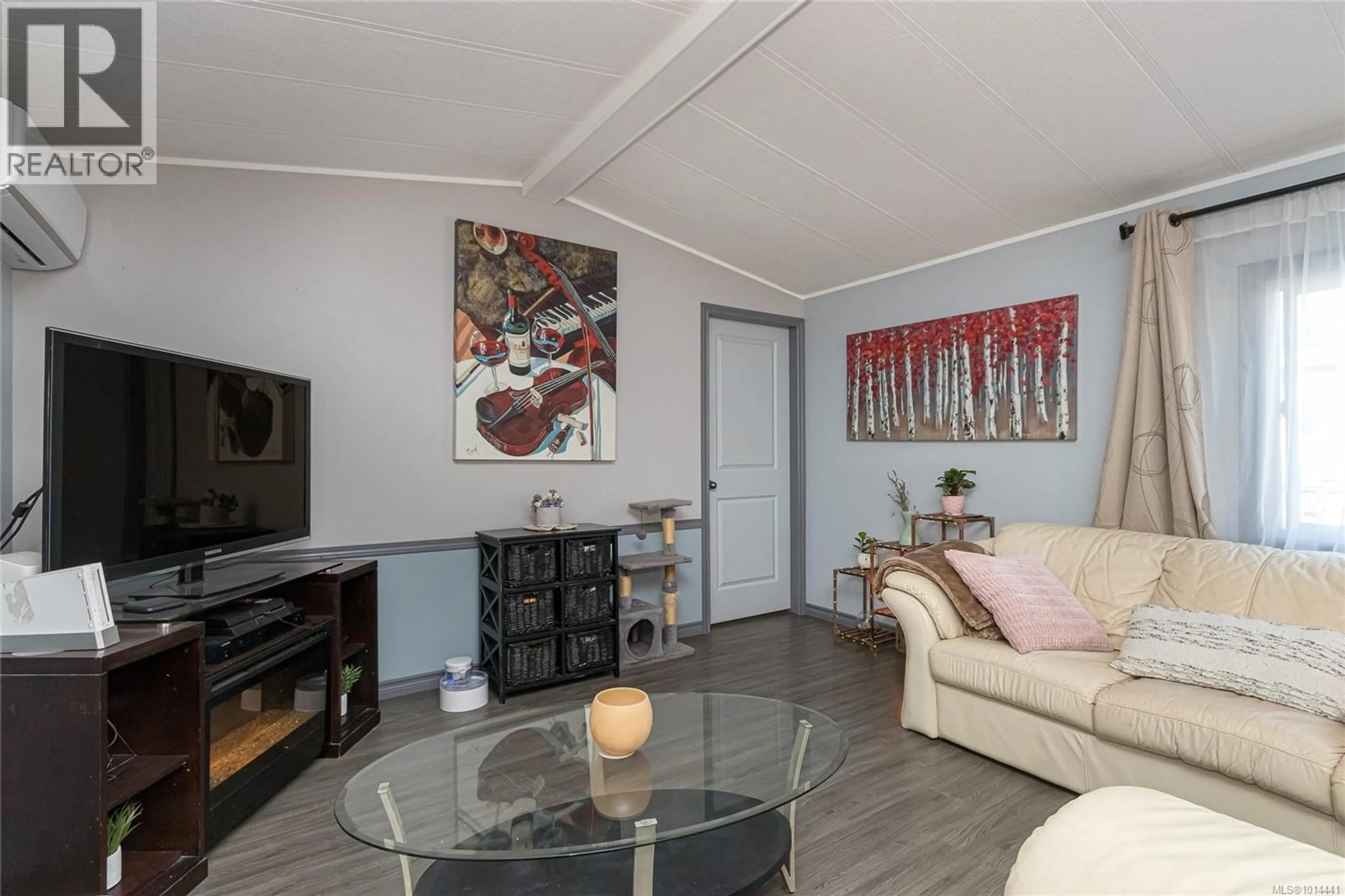 Living room with furniture, wood/laminate floor for 16 - 2847 SOOKE LAKE ROAD, Langford British Columbia V9B4P8