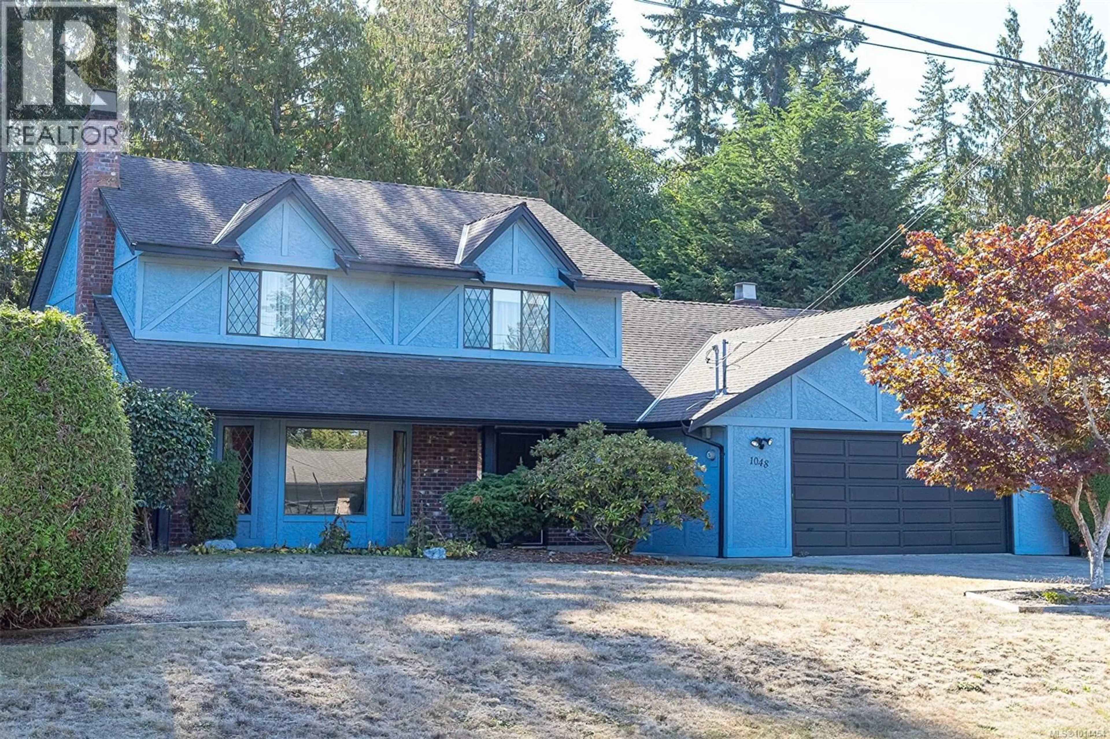 Home with vinyl exterior material, street for 1048 WOOD DUCK PLACE, Qualicum Beach British Columbia V9K1E2