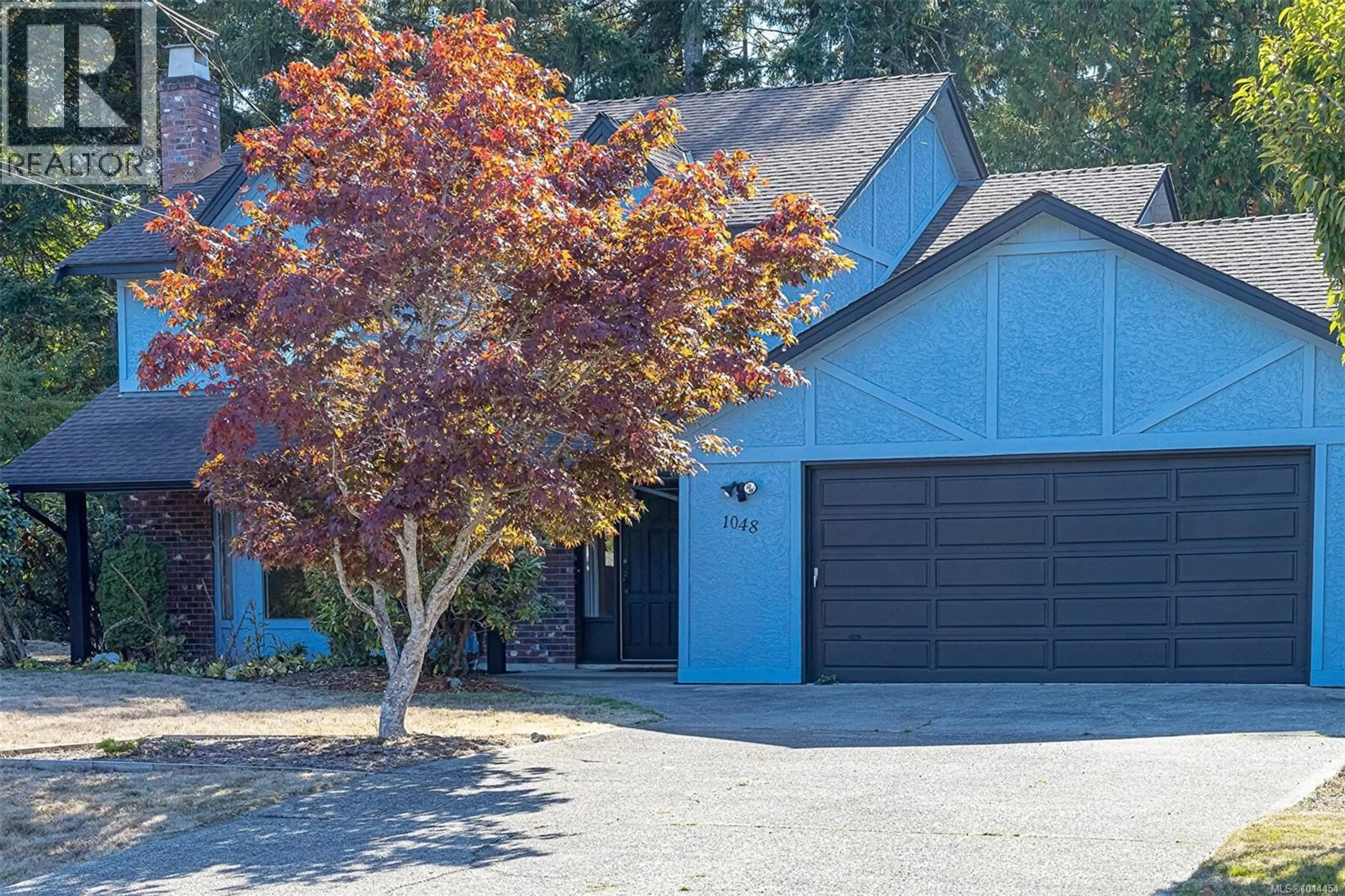Home with vinyl exterior material, street for 1048 WOOD DUCK PLACE, Qualicum Beach British Columbia V9K1E2