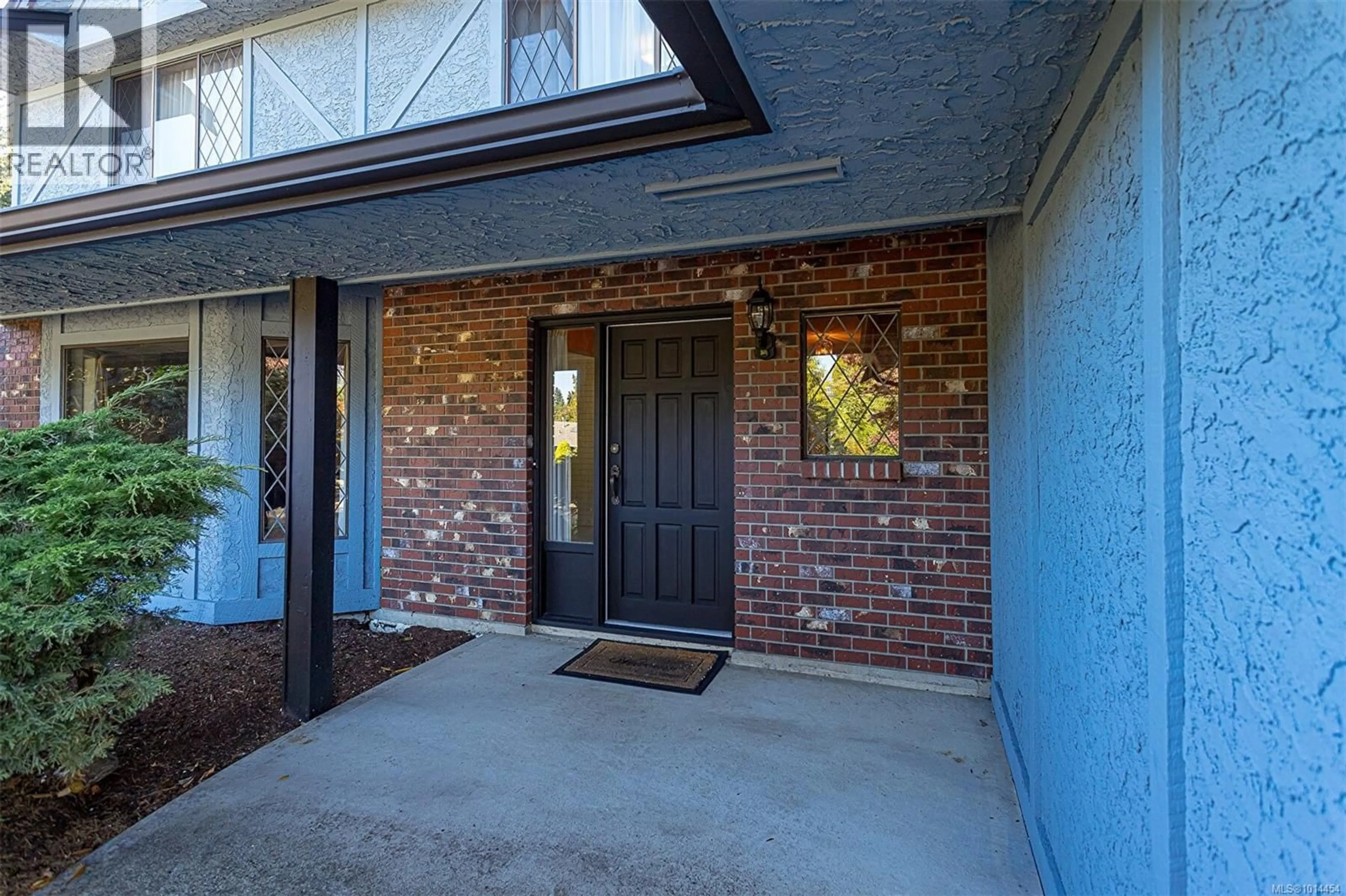 Home with brick exterior material, street for 1048 WOOD DUCK PLACE, Qualicum Beach British Columbia V9K1E2