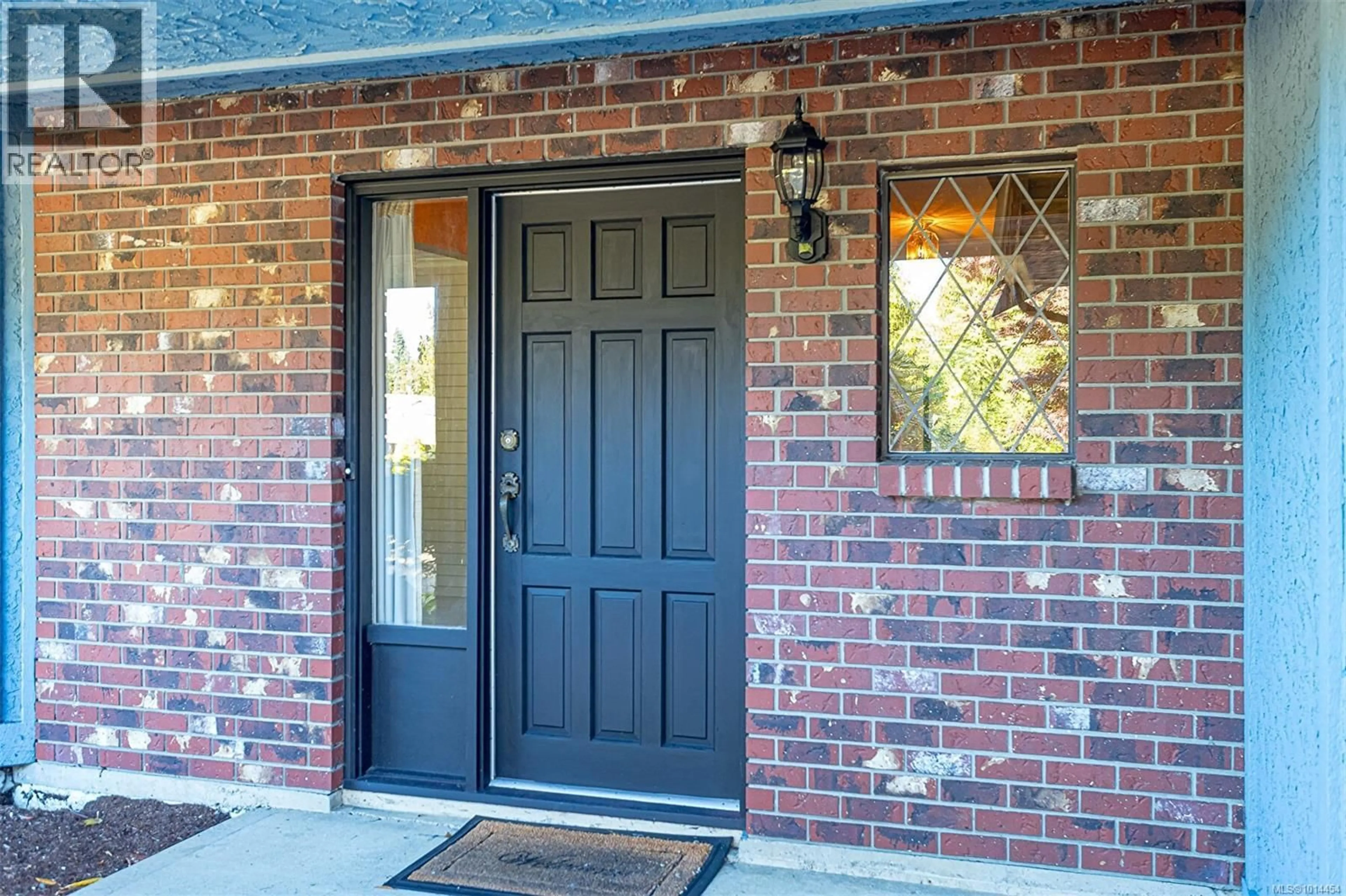 Home with brick exterior material, street for 1048 WOOD DUCK PLACE, Qualicum Beach British Columbia V9K1E2