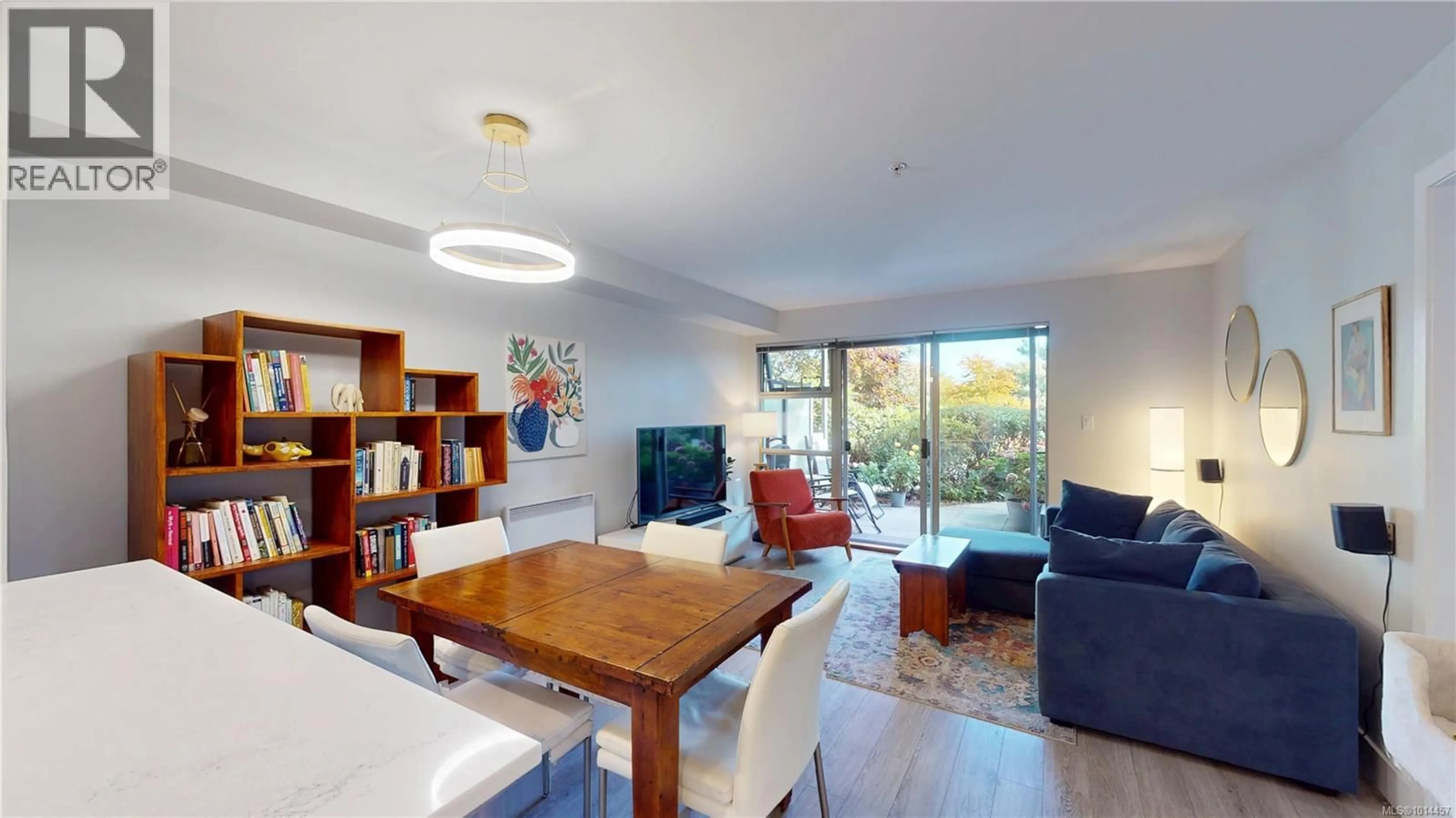 Living room with furniture, wood/laminate floor for 111 - 797 TYEE ROAD, Victoria British Columbia V9A7R4