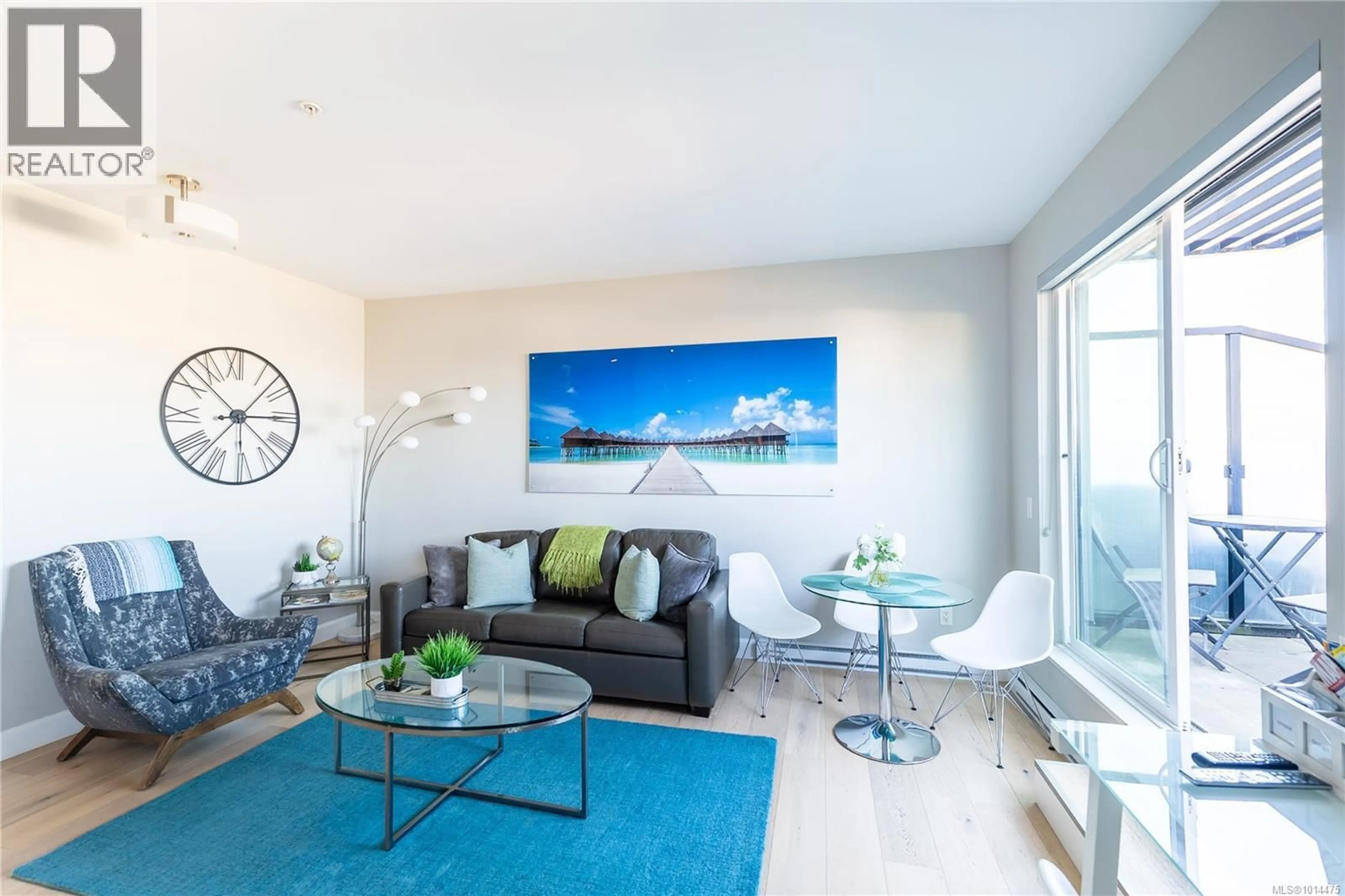 Living room with furniture, unknown for 411 - 595 PANDORA AVENUE, Victoria British Columbia V8W1N4