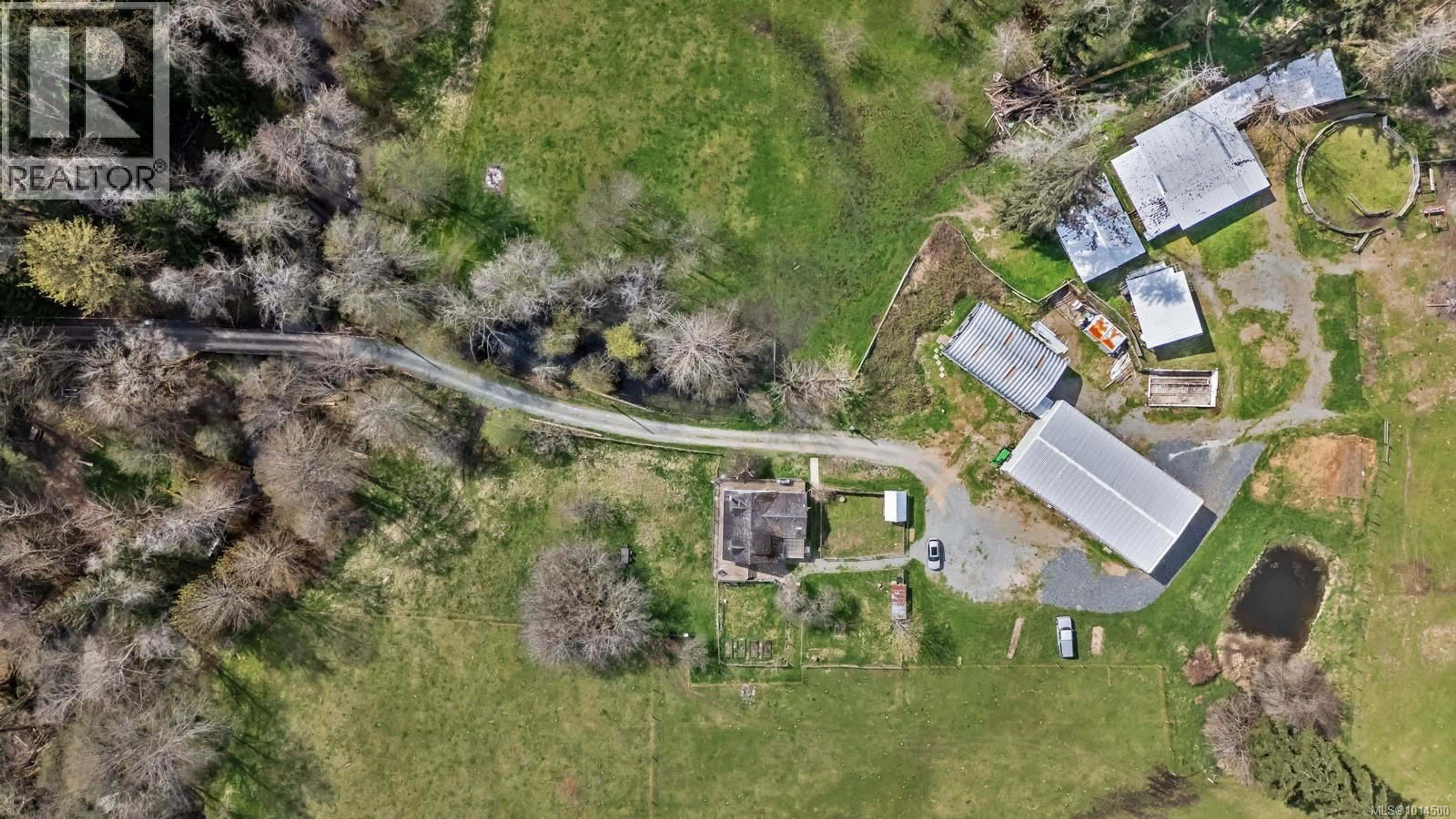 A pic from outside/outdoor area/front of a property/back of a property/a pic from drone, street for 2601 GRAFTON AVENUE, Coombs British Columbia V9K1Y1
