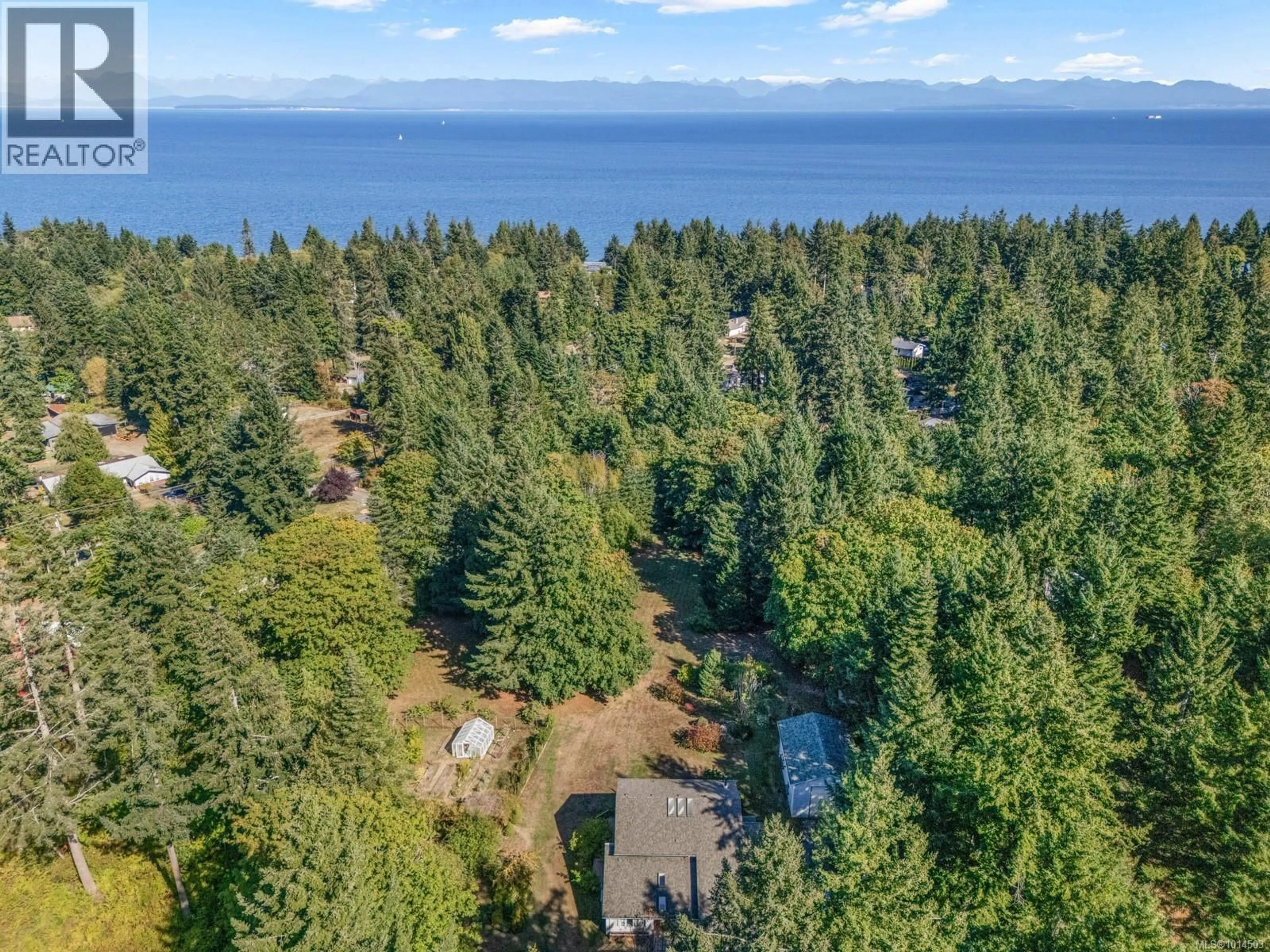 A pic from outside/outdoor area/front of a property/back of a property/a pic from drone, water/lake/river/ocean view for 5910 SEA TERRACE ROAD, Courtenay British Columbia V9J1W1