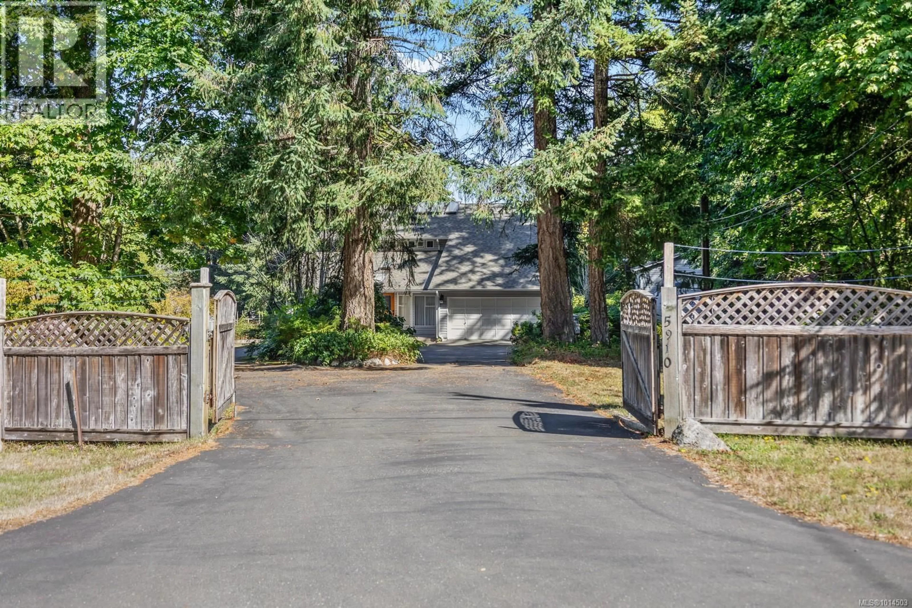 A pic from outside/outdoor area/front of a property/back of a property/a pic from drone, street for 5910 SEA TERRACE ROAD, Courtenay British Columbia V9J1W1