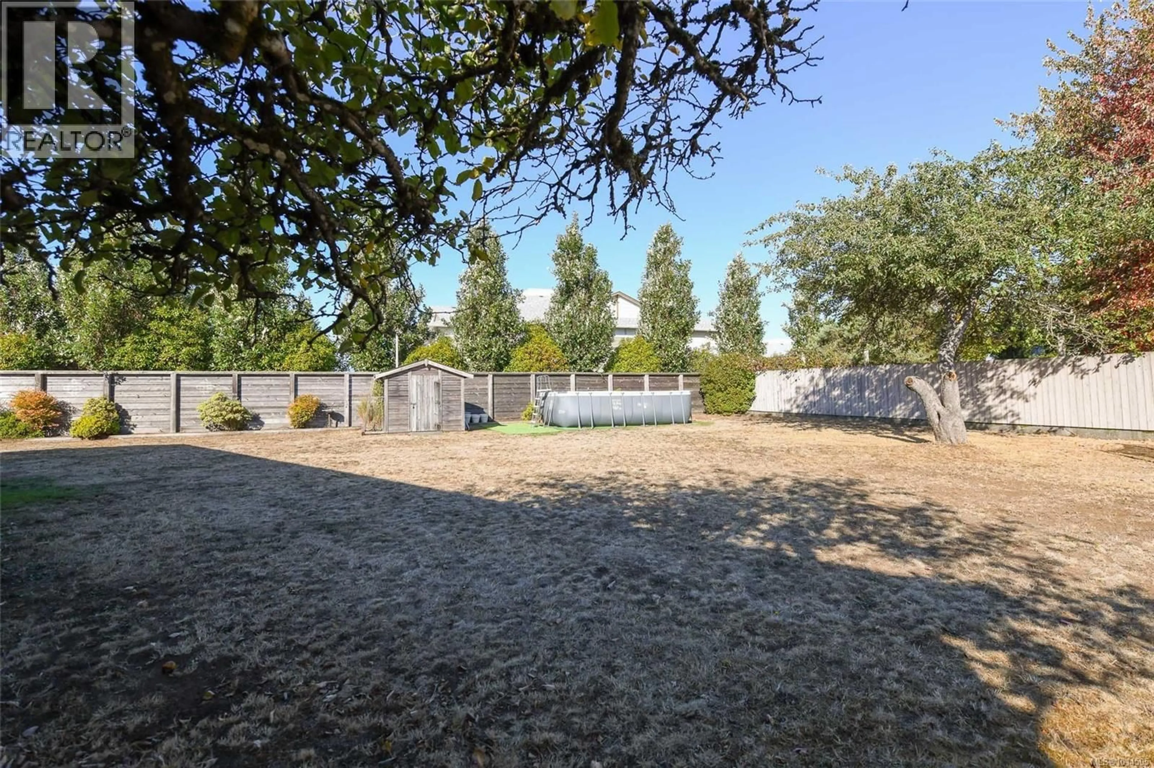 A pic from outside/outdoor area/front of a property/back of a property/a pic from drone, unknown for 1953 COUGAR CRESCENT, Comox British Columbia V9M2K4