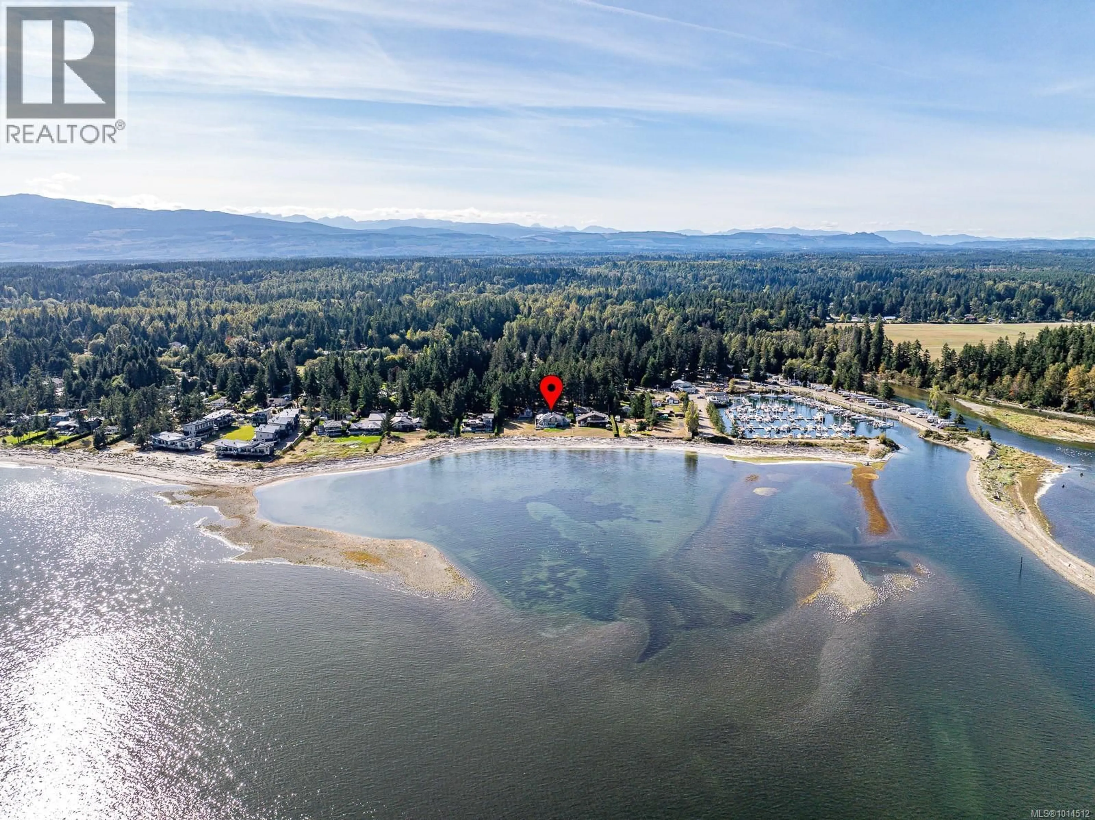 A pic from outside/outdoor area/front of a property/back of a property/a pic from drone, water/lake/river/ocean view for 9060 CLARKSON AVENUE, Black Creek British Columbia V9J1B3