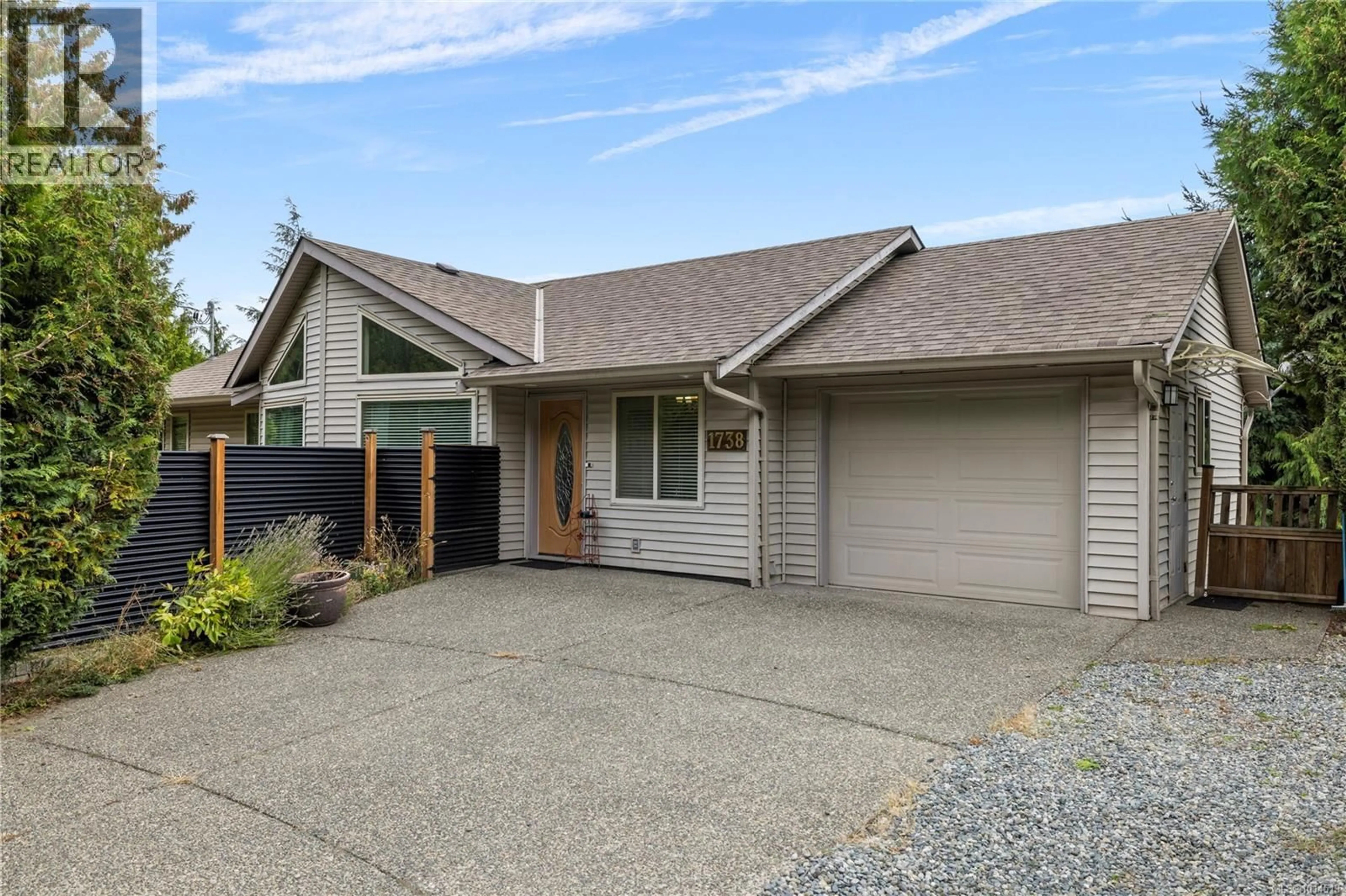 Home with vinyl exterior material, street for 1738 MARTINI WAY, Qualicum Beach British Columbia V9K2S3