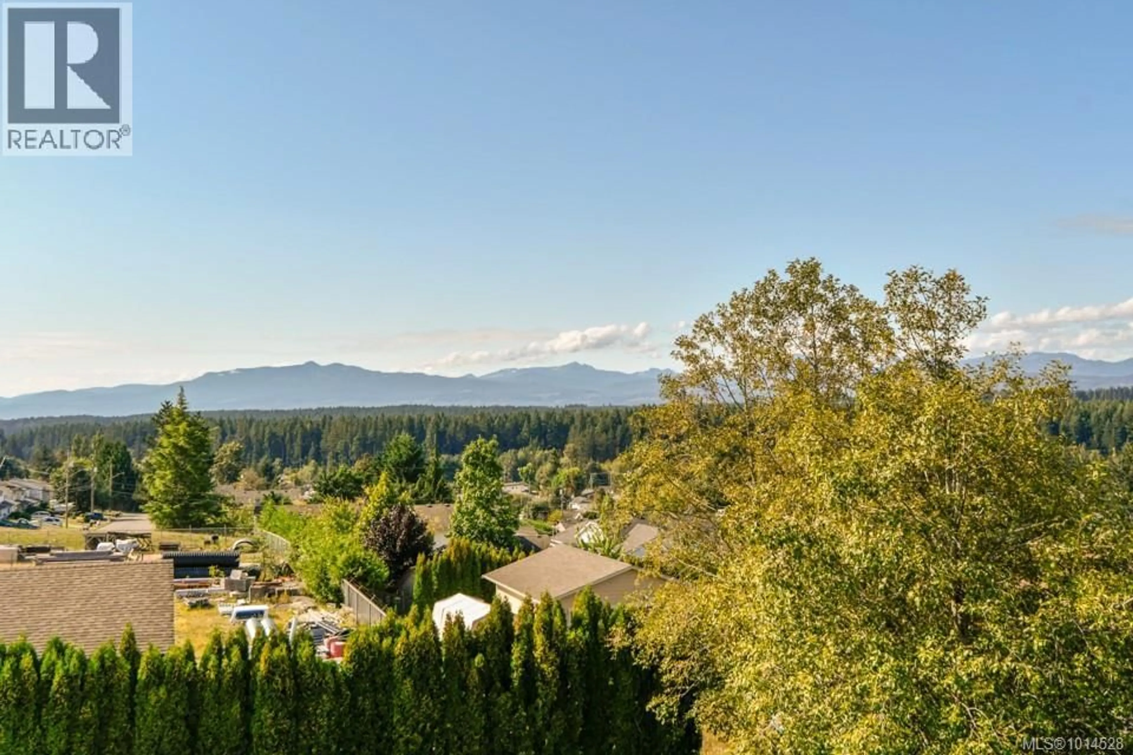 A pic from outside/outdoor area/front of a property/back of a property/a pic from drone, mountain view for 306 - 280 DOGWOOD STREET SOUTH, Campbell River British Columbia V9W6Y7