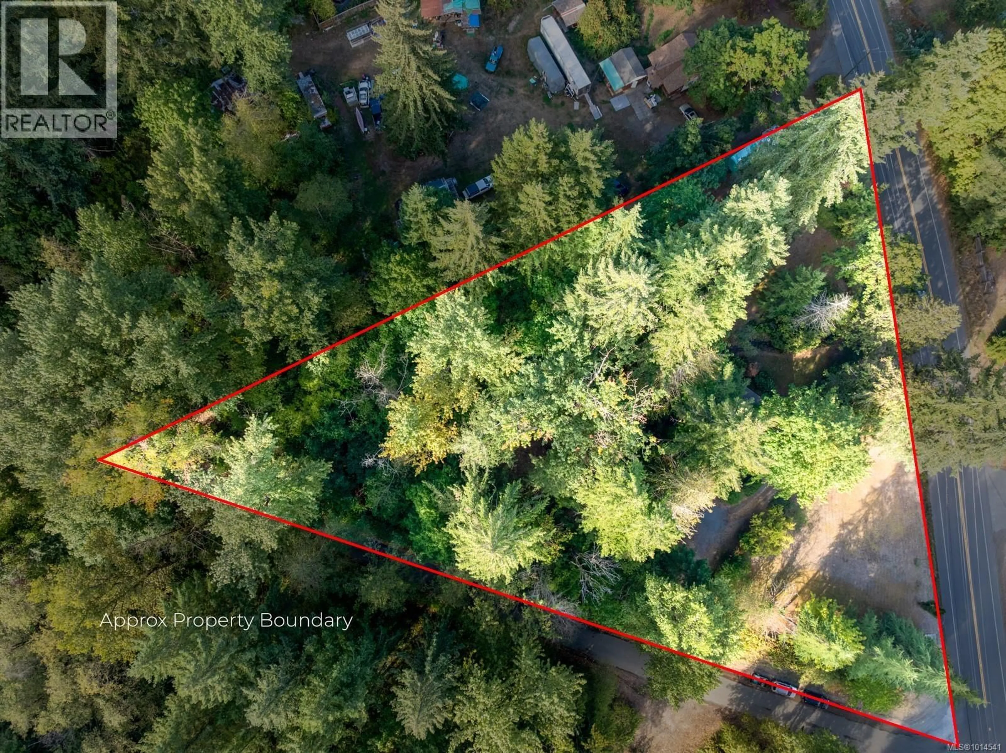 A pic from outside/outdoor area/front of a property/back of a property/a pic from drone, forest/trees view for 2875 CUMBERLAND ROAD, Courtenay British Columbia V9N9P1