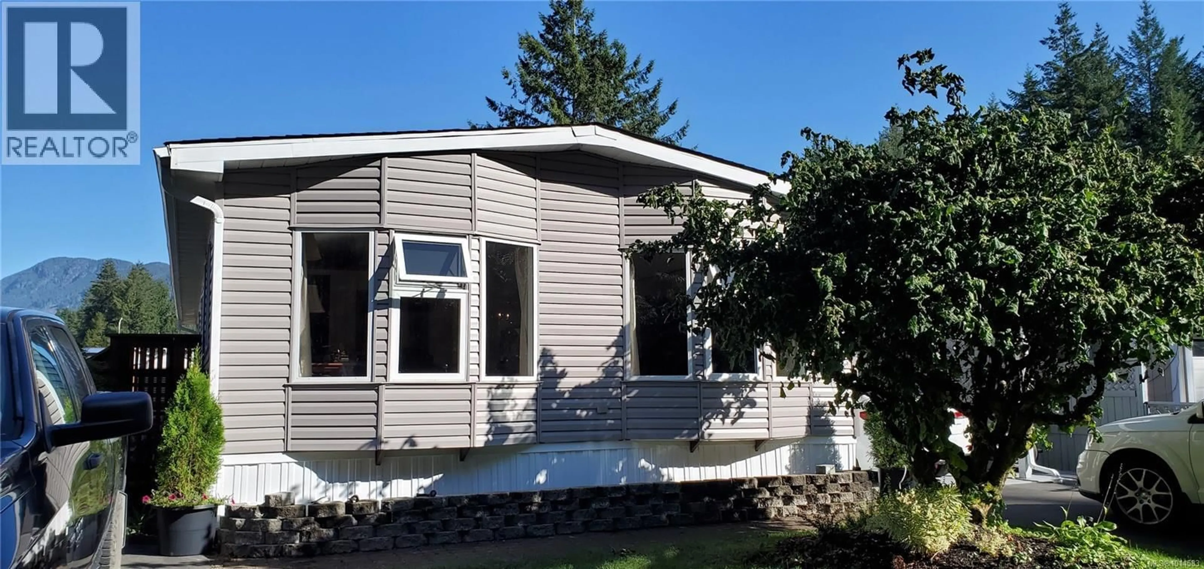 Home with vinyl exterior material, street for 608 WHITE RIDGE DRIVE, Gold River British Columbia V0P1G0