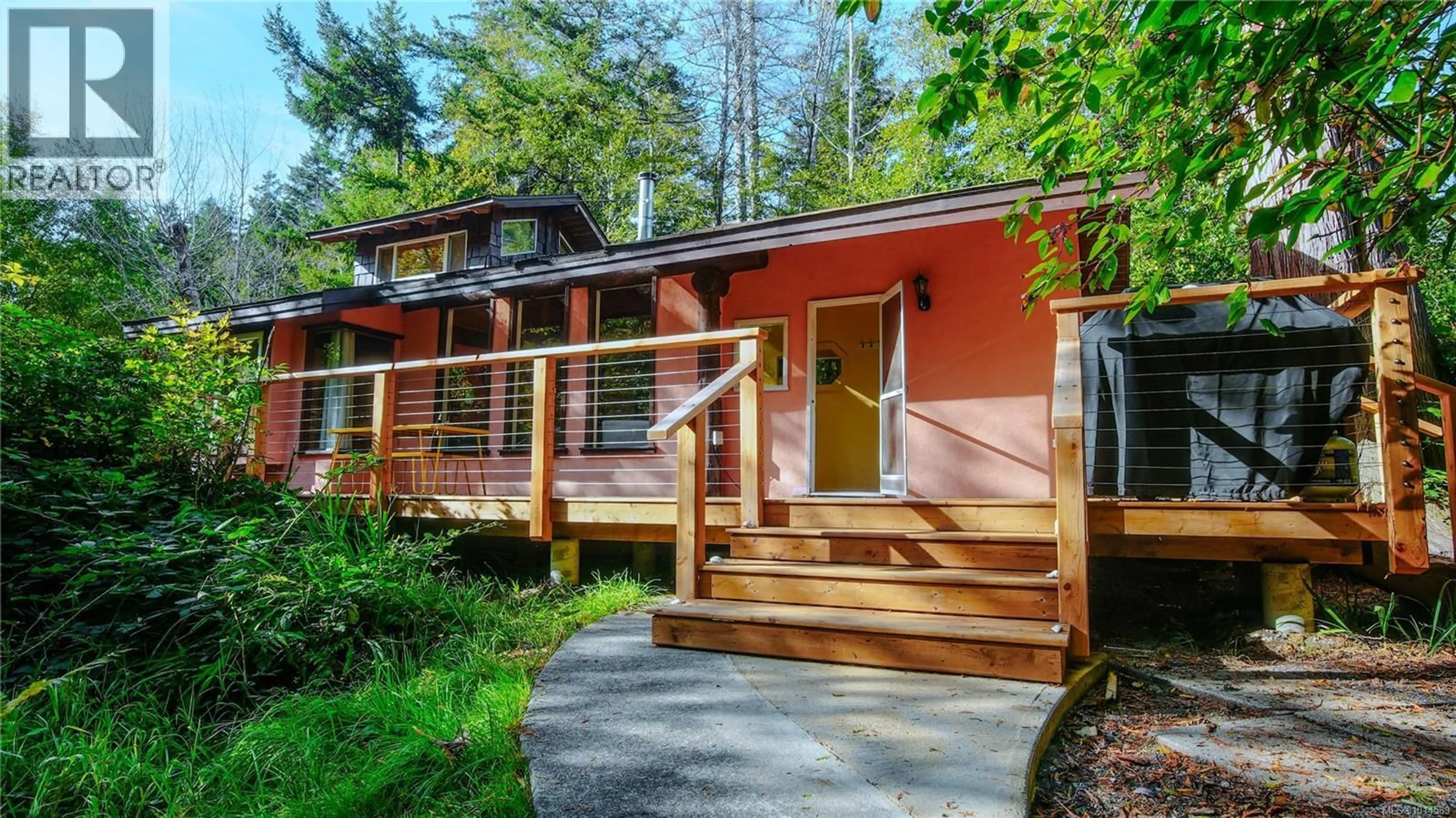 Home with vinyl exterior material, street for 5065 SANDPIPER ROAD, Hornby Island British Columbia V0R1Z0