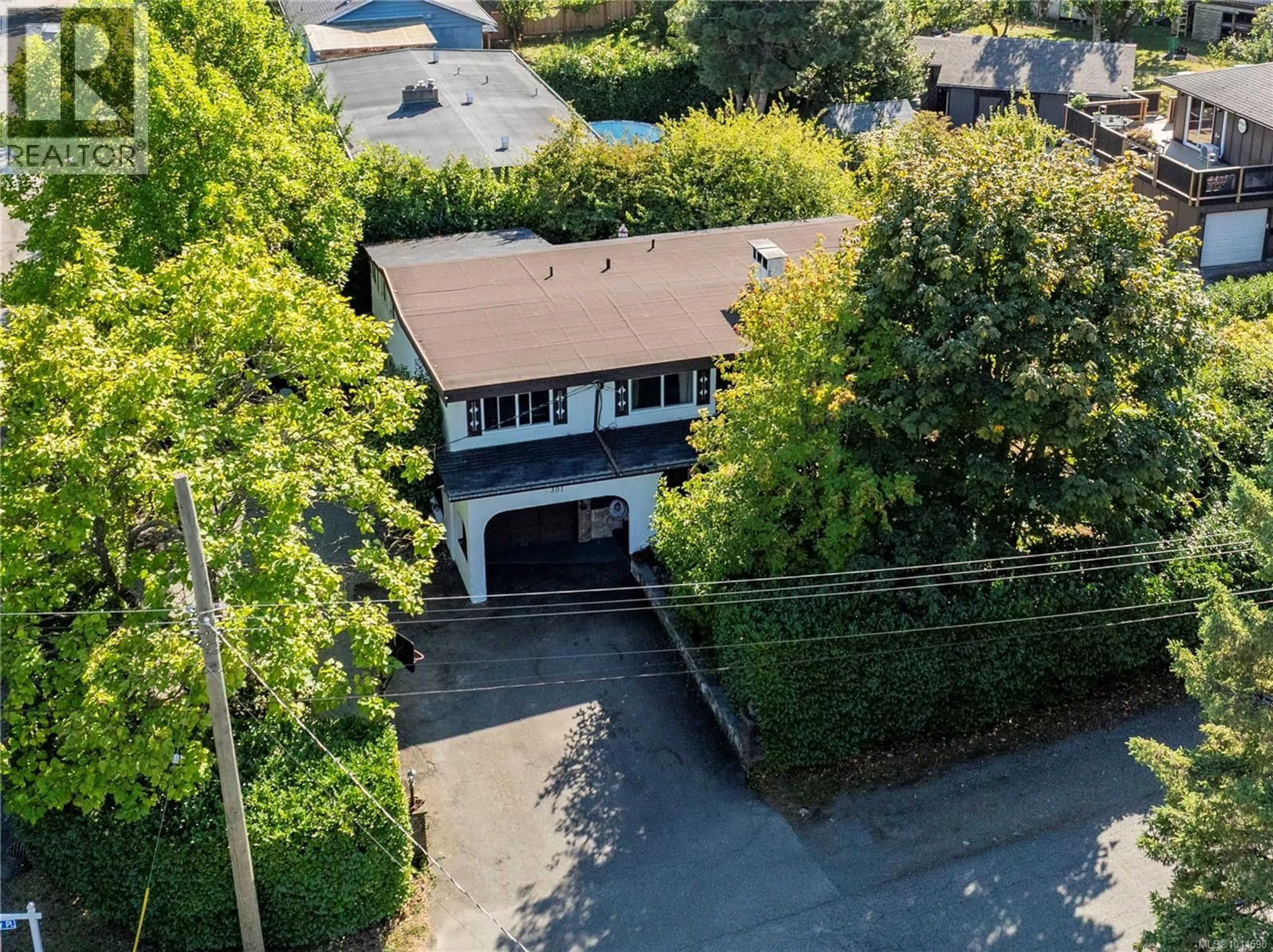 A pic from outside/outdoor area/front of a property/back of a property/a pic from drone, street for 301 PUTTER PLACE, Nanaimo British Columbia V9T1V2