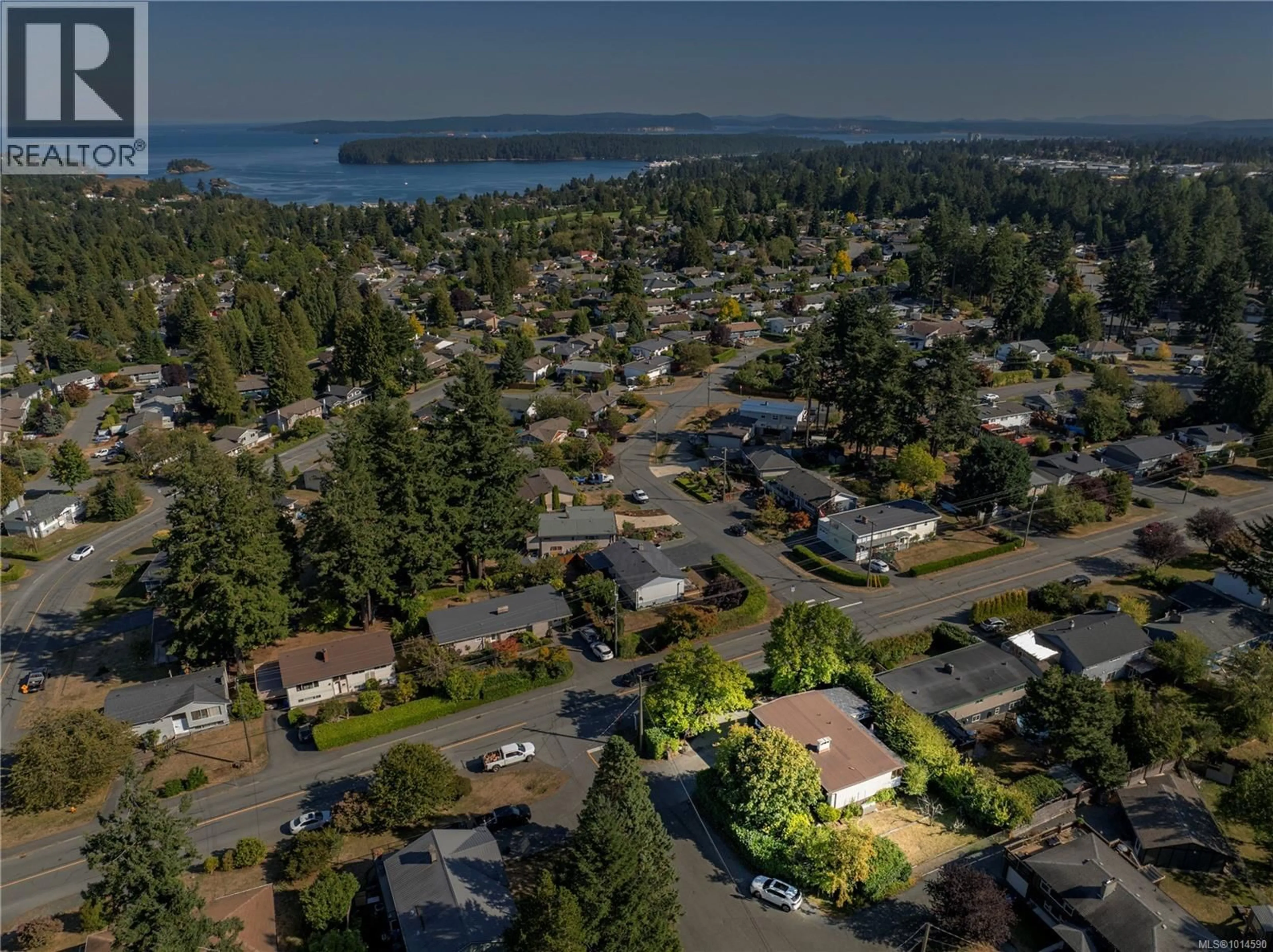 A pic from outside/outdoor area/front of a property/back of a property/a pic from drone, unknown for 301 PUTTER PLACE, Nanaimo British Columbia V9T1V2