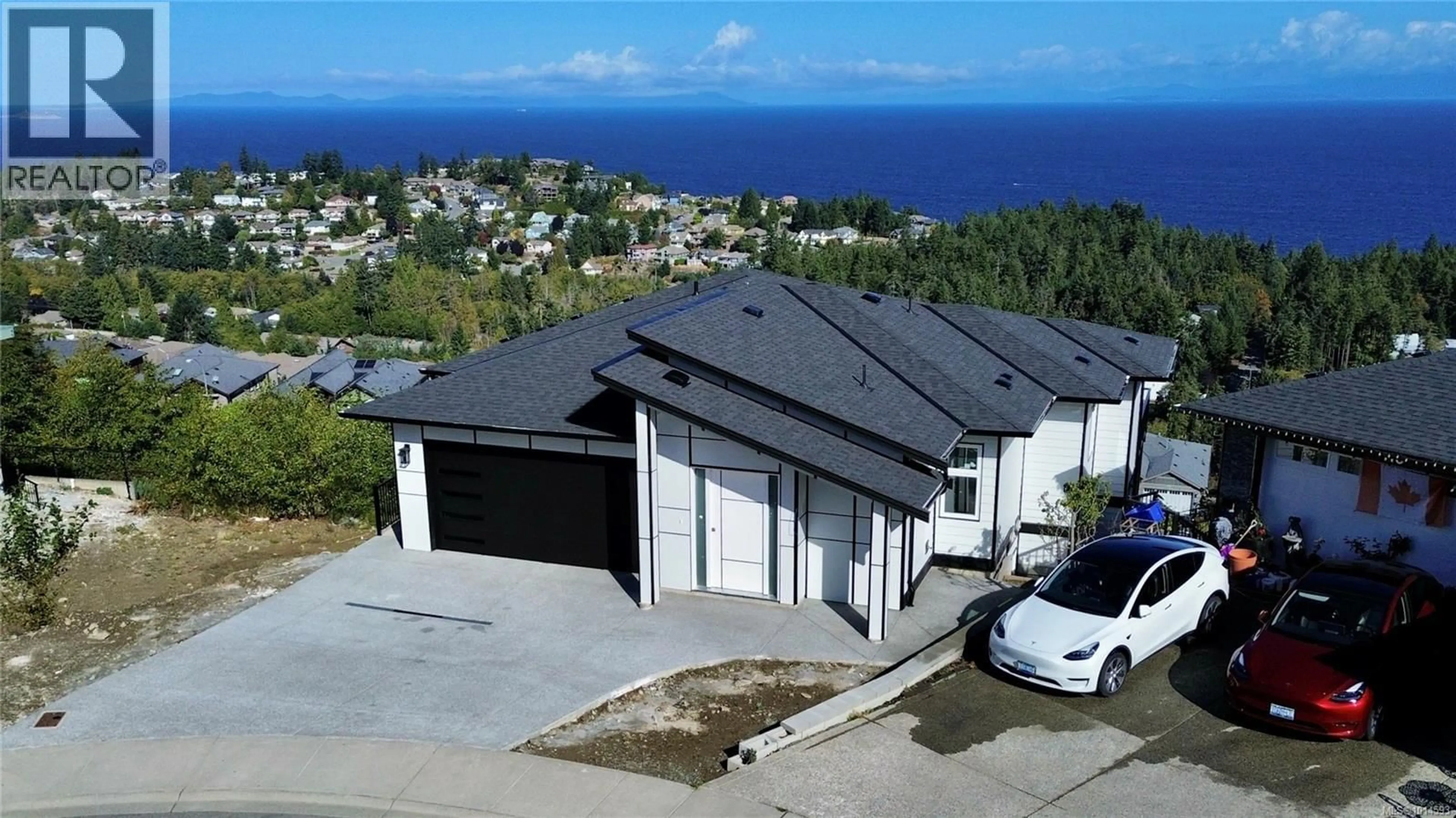 A pic from outside/outdoor area/front of a property/back of a property/a pic from drone, street for 114 ABALONE PLACE SOUTH, Nanaimo British Columbia V9T0L3