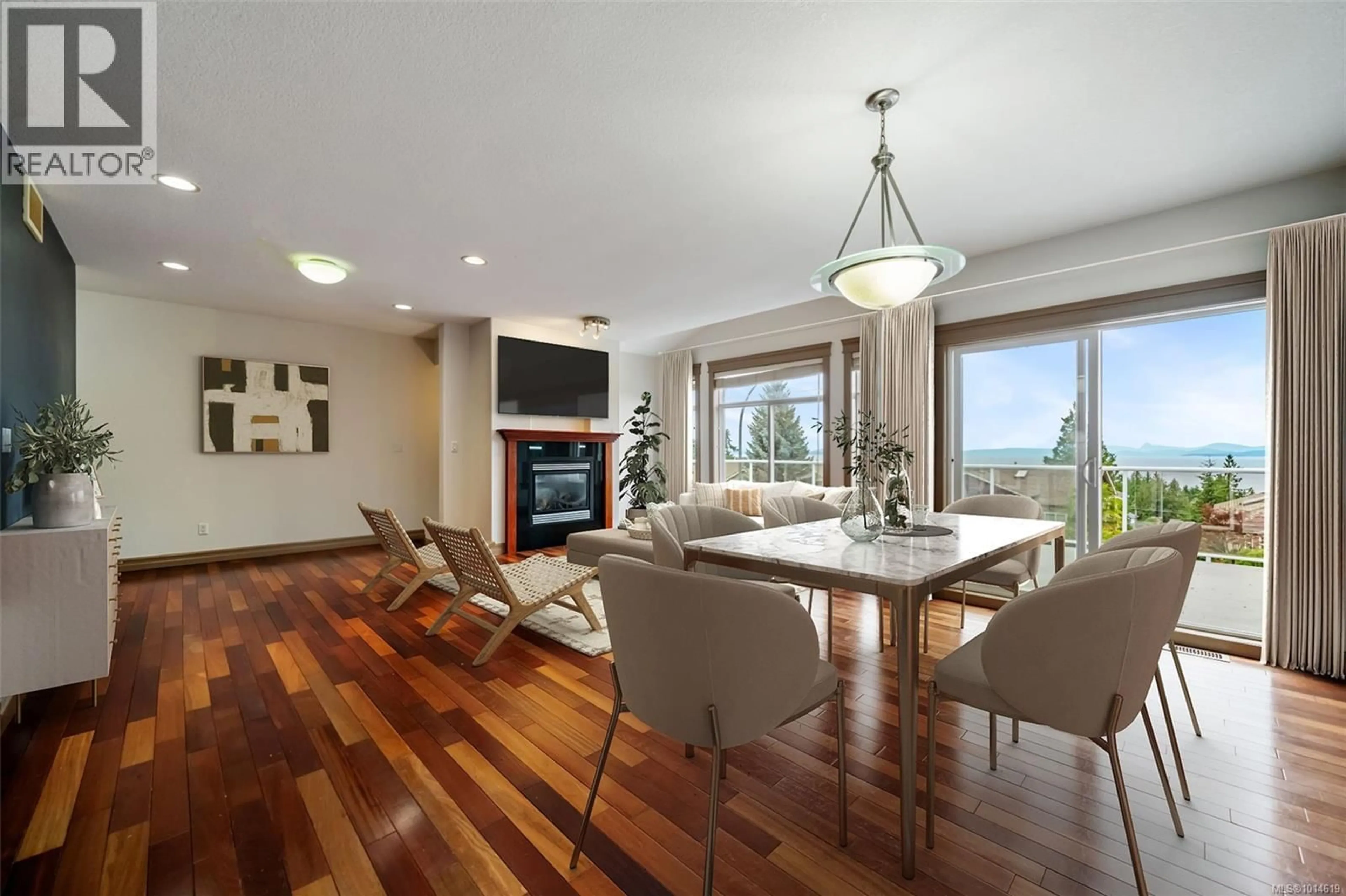 Dining room, wood/laminate floor for 5529 NORTON ROAD, Nanaimo British Columbia V9T6S2