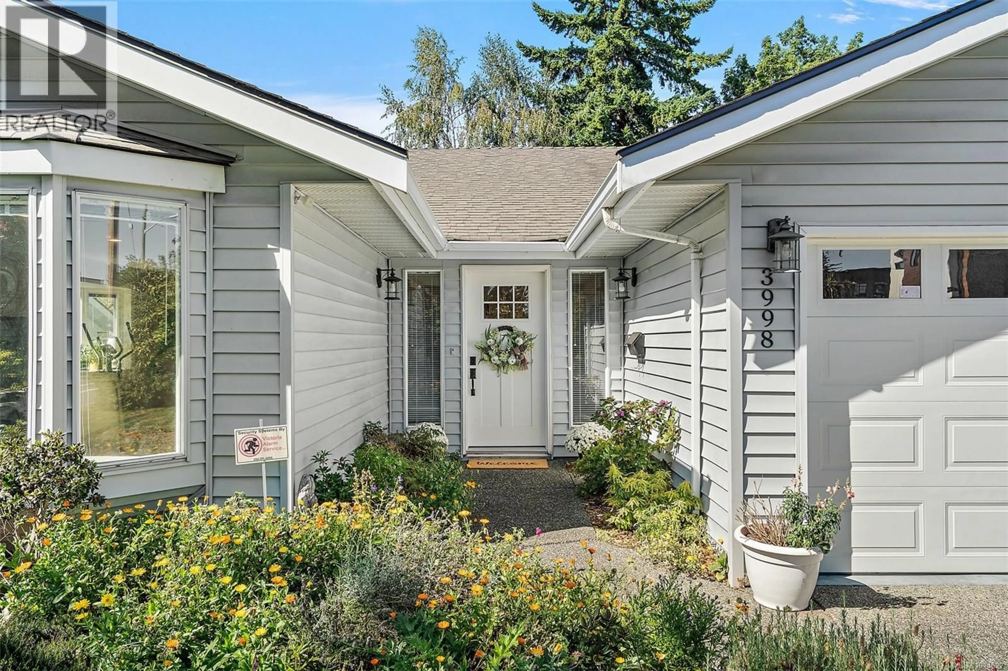 Home with vinyl exterior material, street for 3998 CEDAR HILL ROAD, Saanich British Columbia V8N3C1