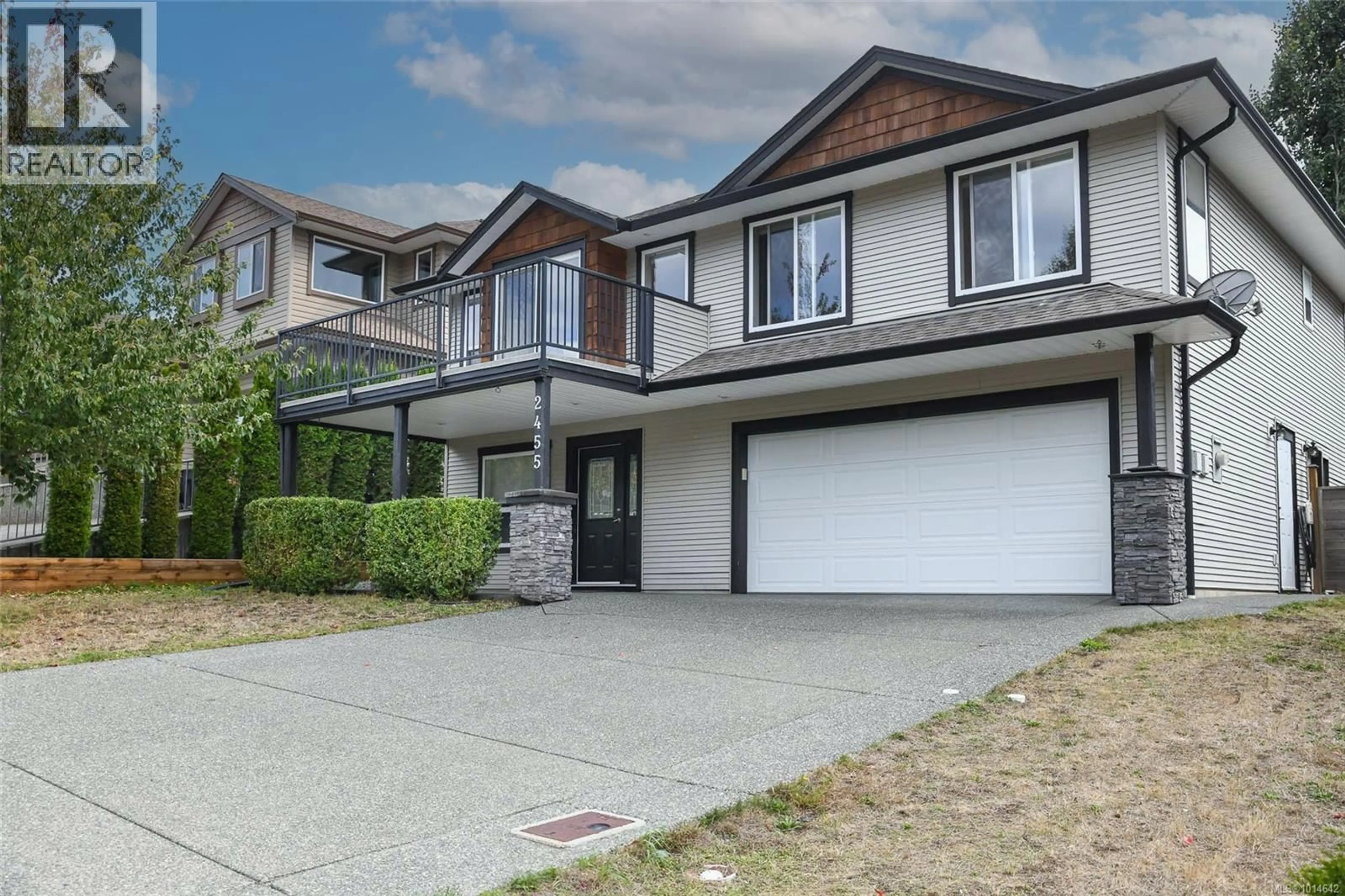 Home with vinyl exterior material, street for 2455 AVRO ARROW DRIVE, Comox British Columbia V9M0A6