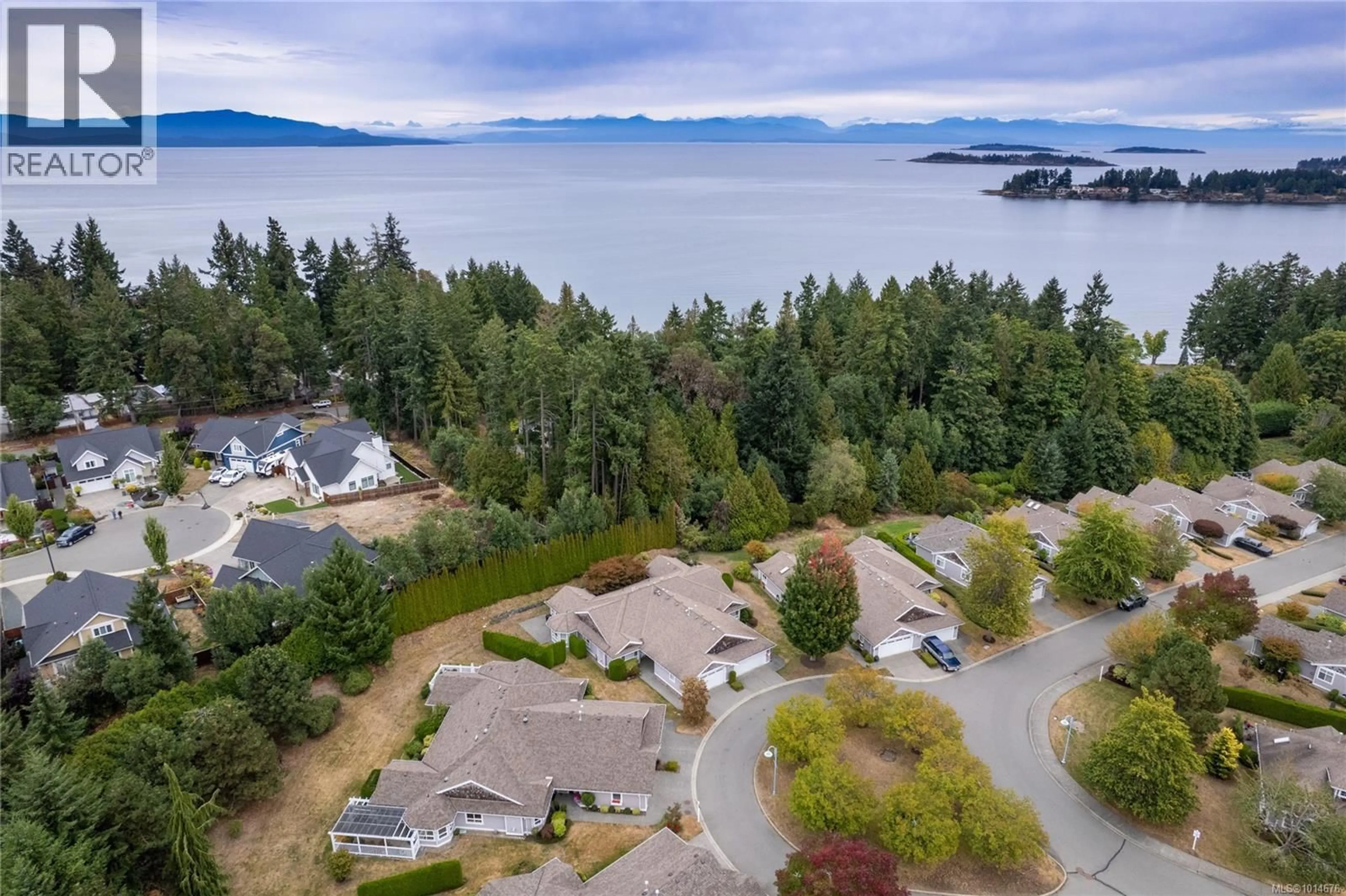 A pic from outside/outdoor area/front of a property/back of a property/a pic from drone, water/lake/river/ocean view for 1205 SATURNA DRIVE, Parksville British Columbia V9P2X5