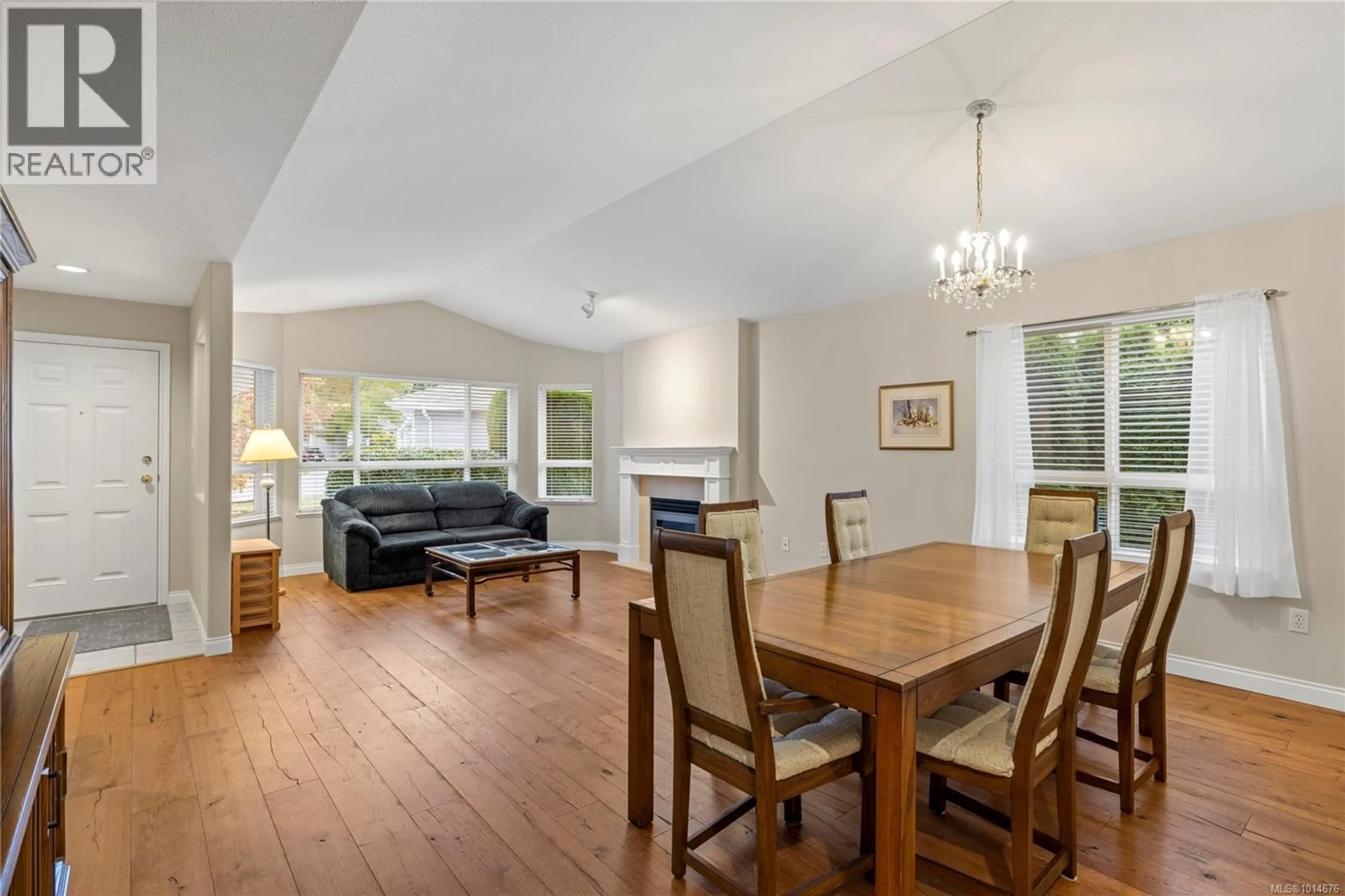 Dining room, wood/laminate floor for 1205 SATURNA DRIVE, Parksville British Columbia V9P2X5