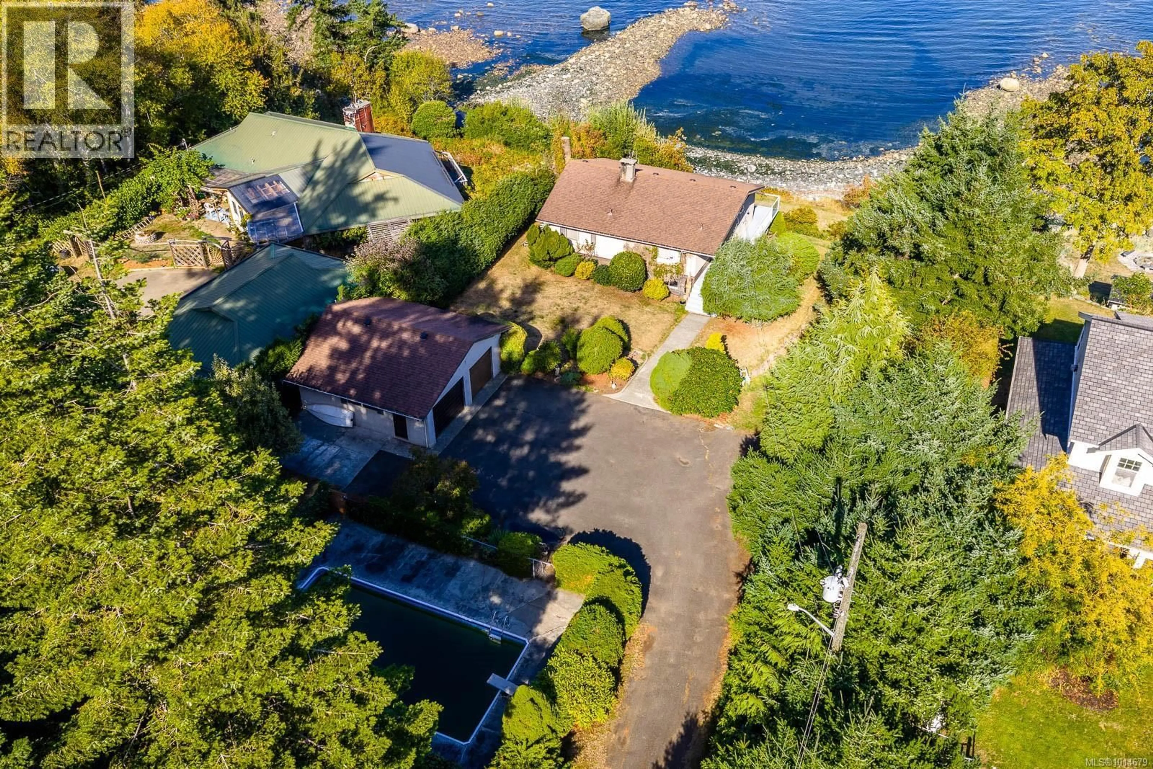 A pic from outside/outdoor area/front of a property/back of a property/a pic from drone, water/lake/river/ocean view for 2332 SEABANK ROAD, Courtenay British Columbia V9J1X5