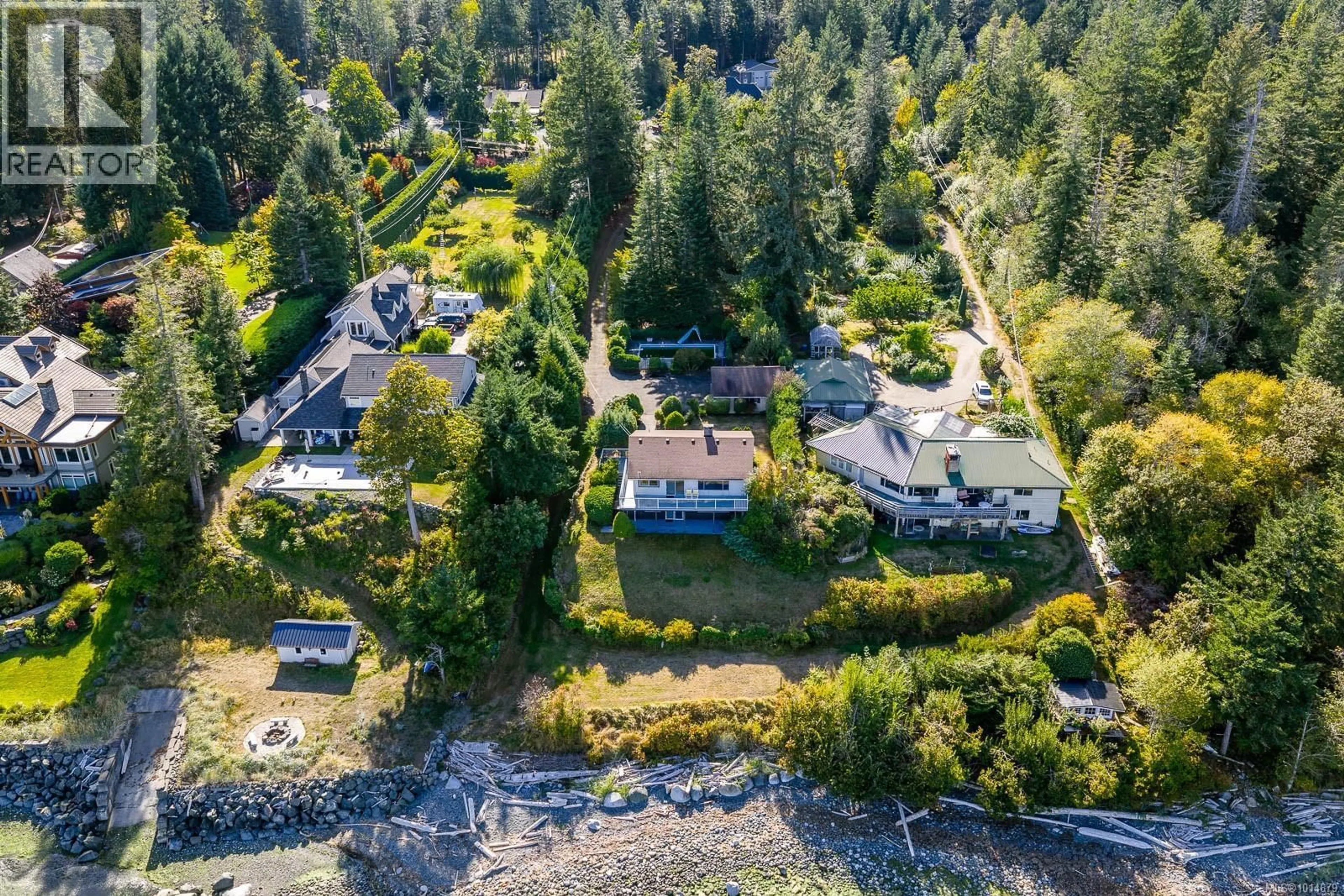 A pic from outside/outdoor area/front of a property/back of a property/a pic from drone, water/lake/river/ocean view for 2332 SEABANK ROAD, Courtenay British Columbia V9J1X5