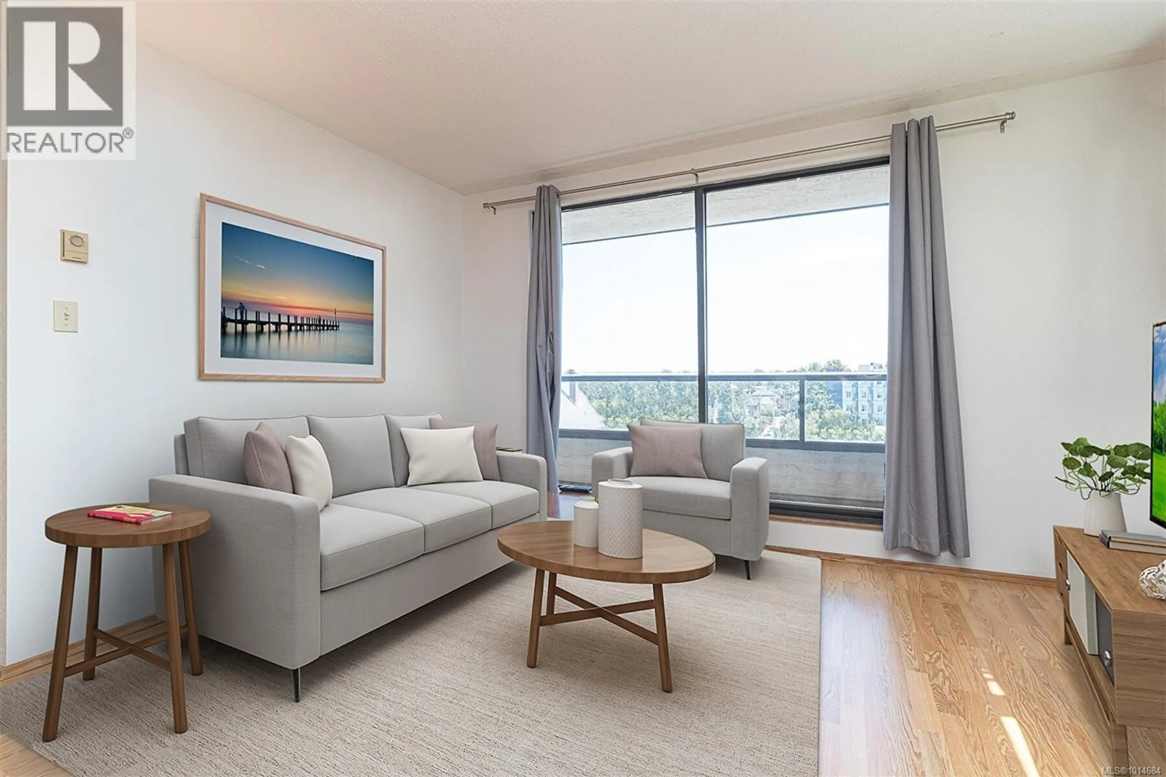 Living room with furniture, wood/laminate floor for 809 - 1630 QUADRA STREET, Victoria British Columbia V8W3J5