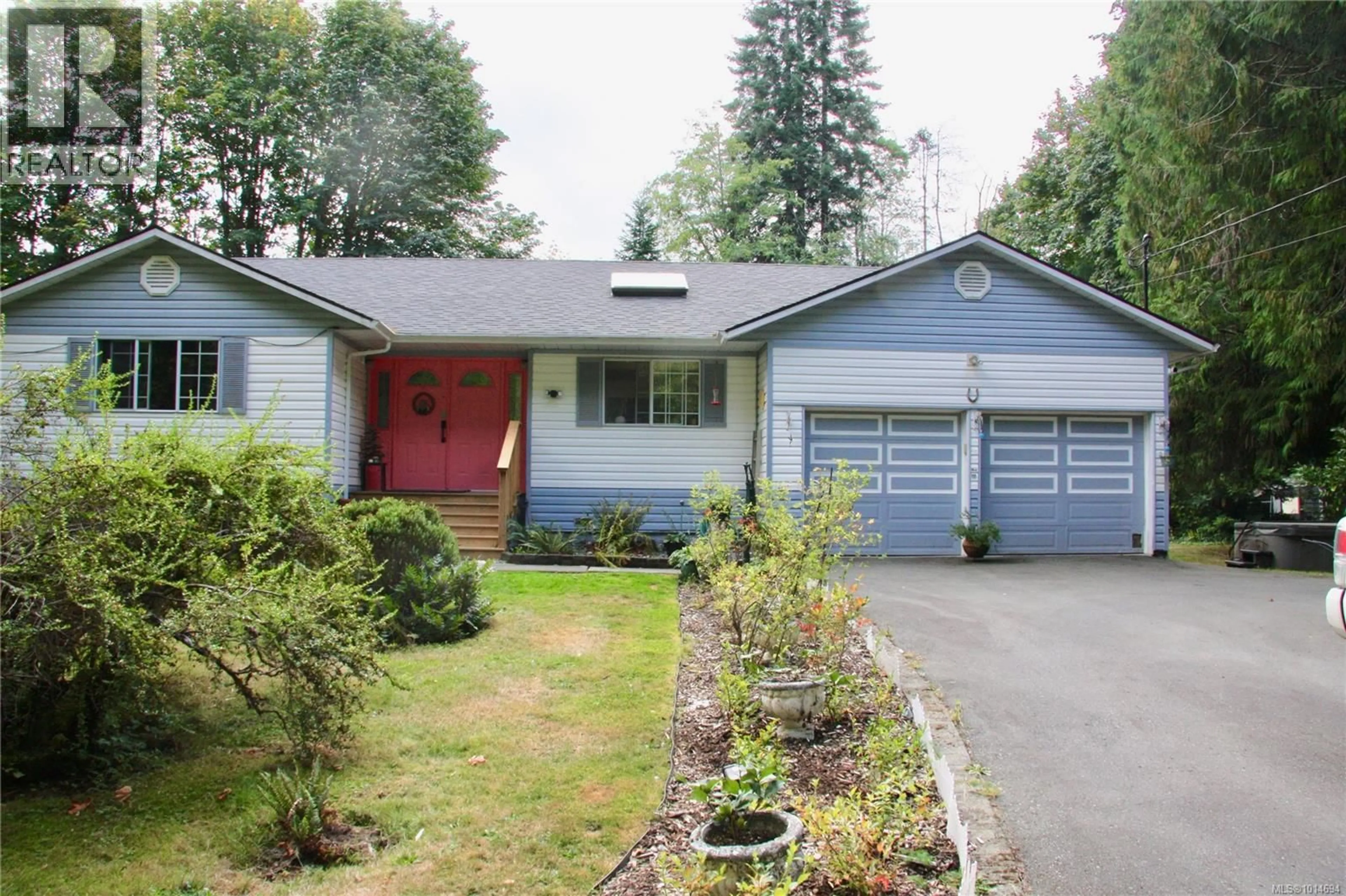 Home with vinyl exterior material, street for 10258 SUTTON ROAD, Honeymoon Bay British Columbia V0R1Y0