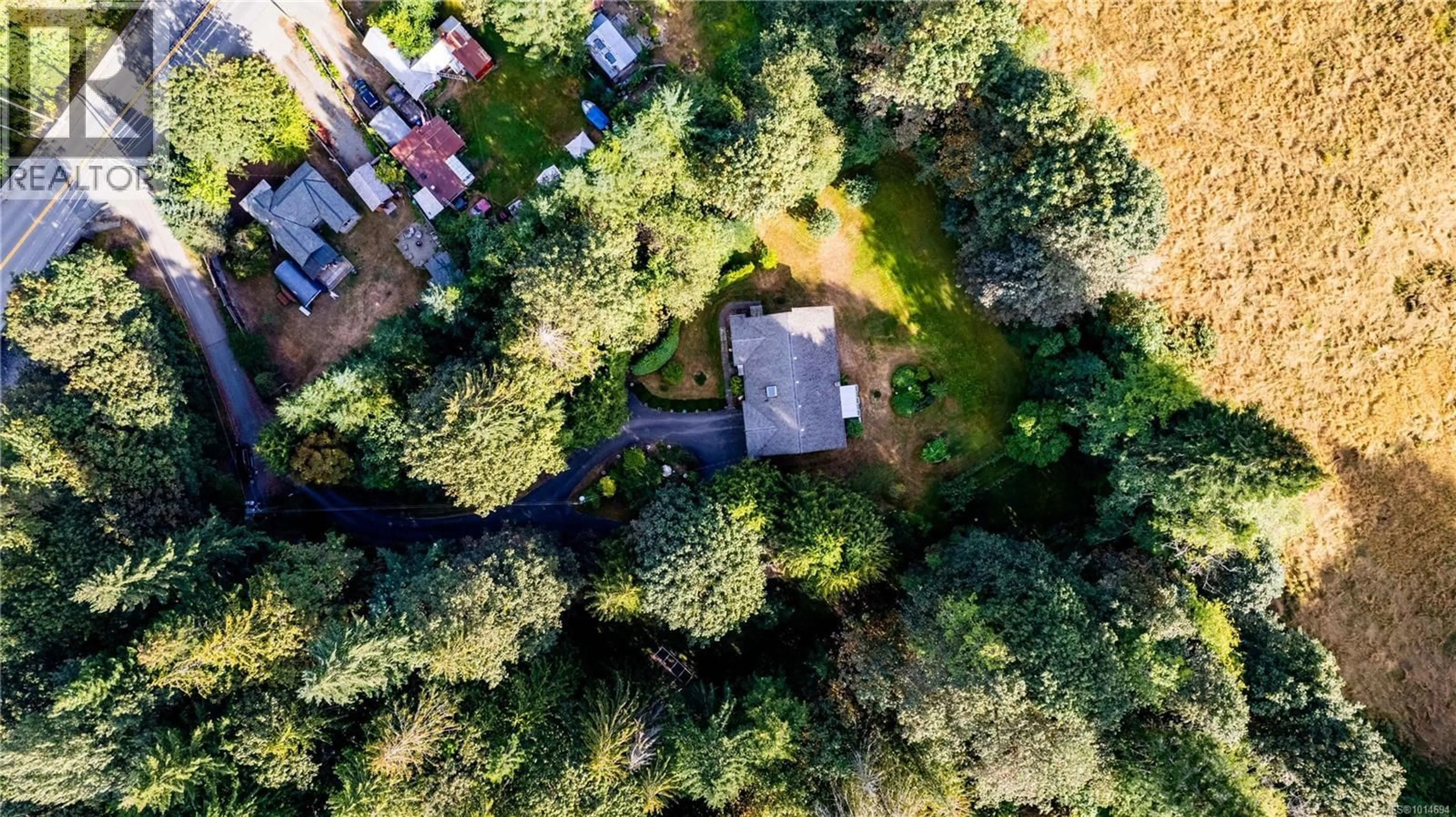 A pic from outside/outdoor area/front of a property/back of a property/a pic from drone, forest/trees view for 10258 SUTTON ROAD, Honeymoon Bay British Columbia V0R1Y0