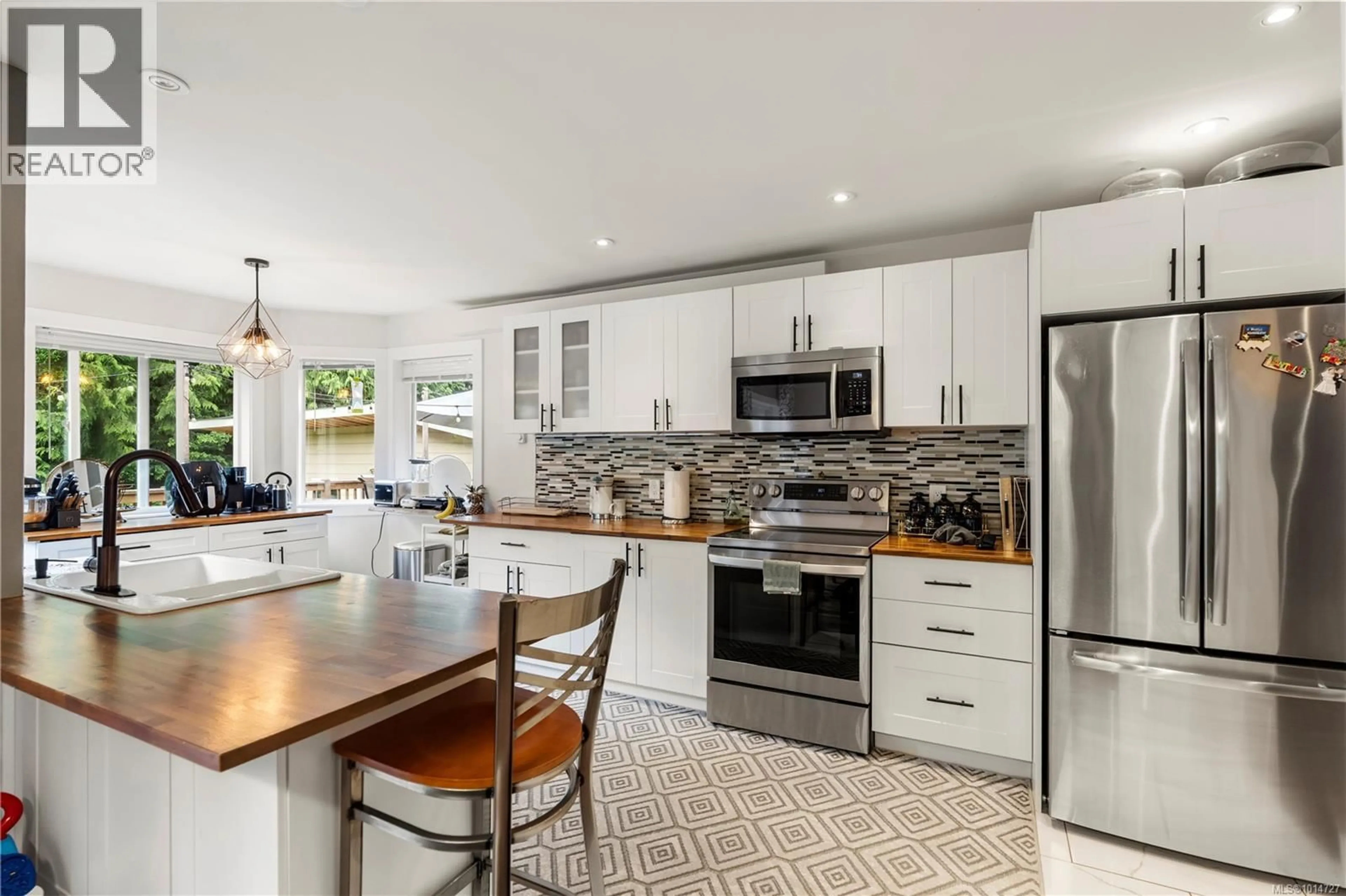 Open concept kitchen, ceramic/tile floor for 5839 BLYTHWOOD ROAD, Sooke British Columbia V9Z0G3