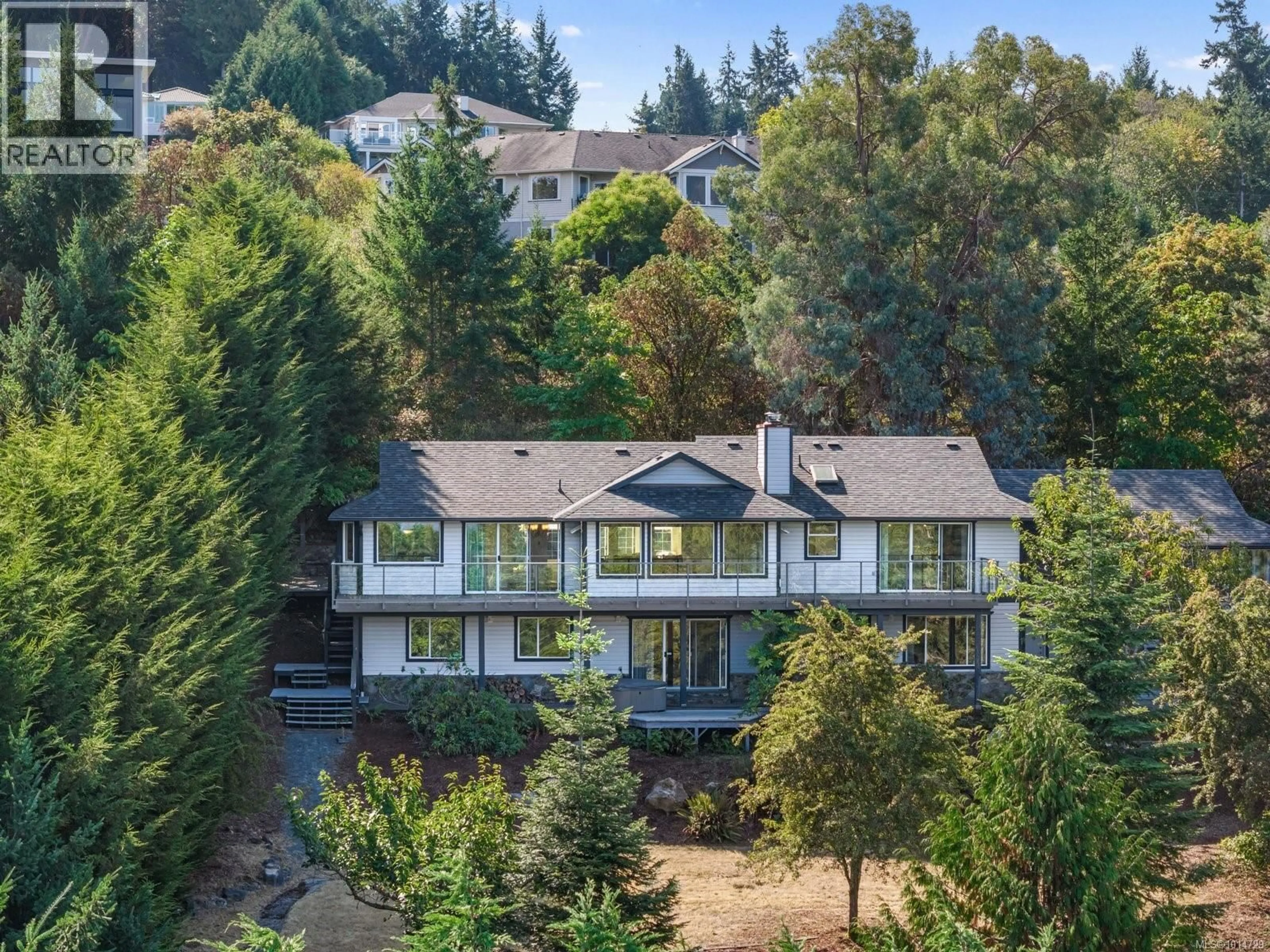 A pic from outside/outdoor area/front of a property/back of a property/a pic from drone, unknown for 1319 LANDS END ROAD, North Saanich British Columbia V8L5K1