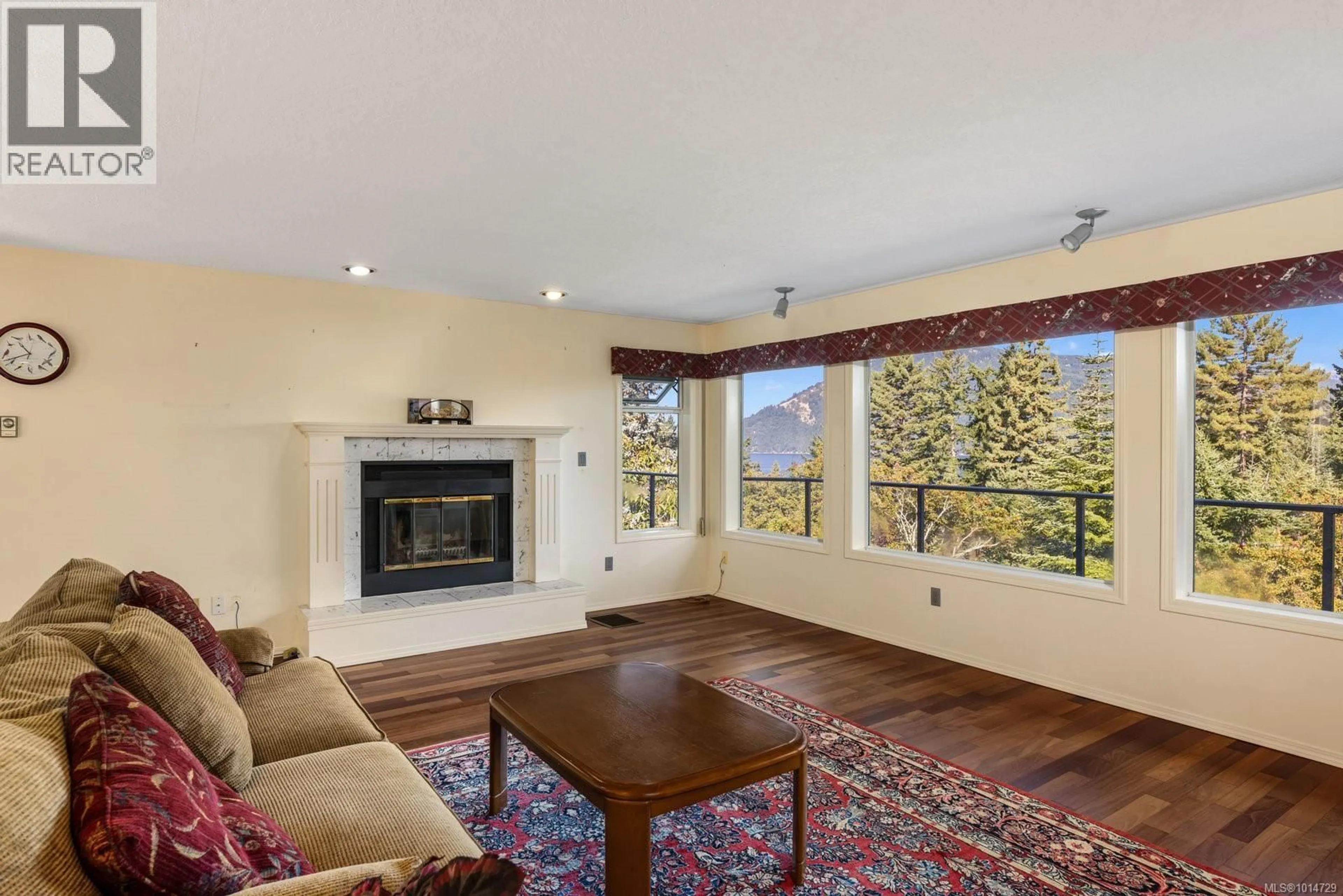 Living room with furniture, unknown for 1319 LANDS END ROAD, North Saanich British Columbia V8L5K1