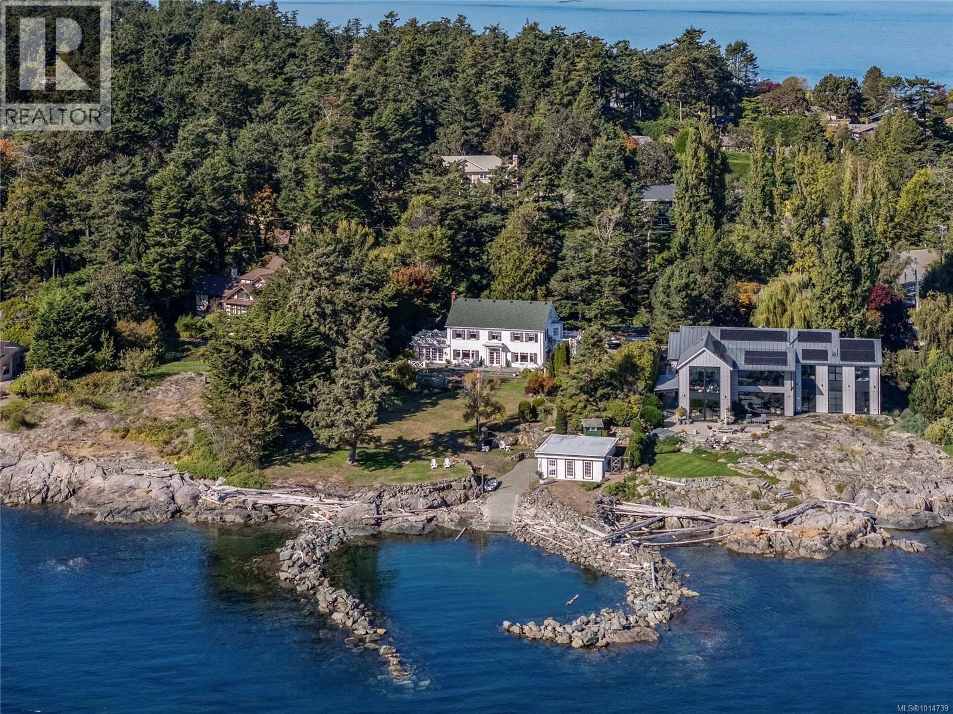 A pic from outside/outdoor area/front of a property/back of a property/a pic from drone, water/lake/river/ocean view for 3045 MCANALLY ROAD, Saanich British Columbia V8N1T3