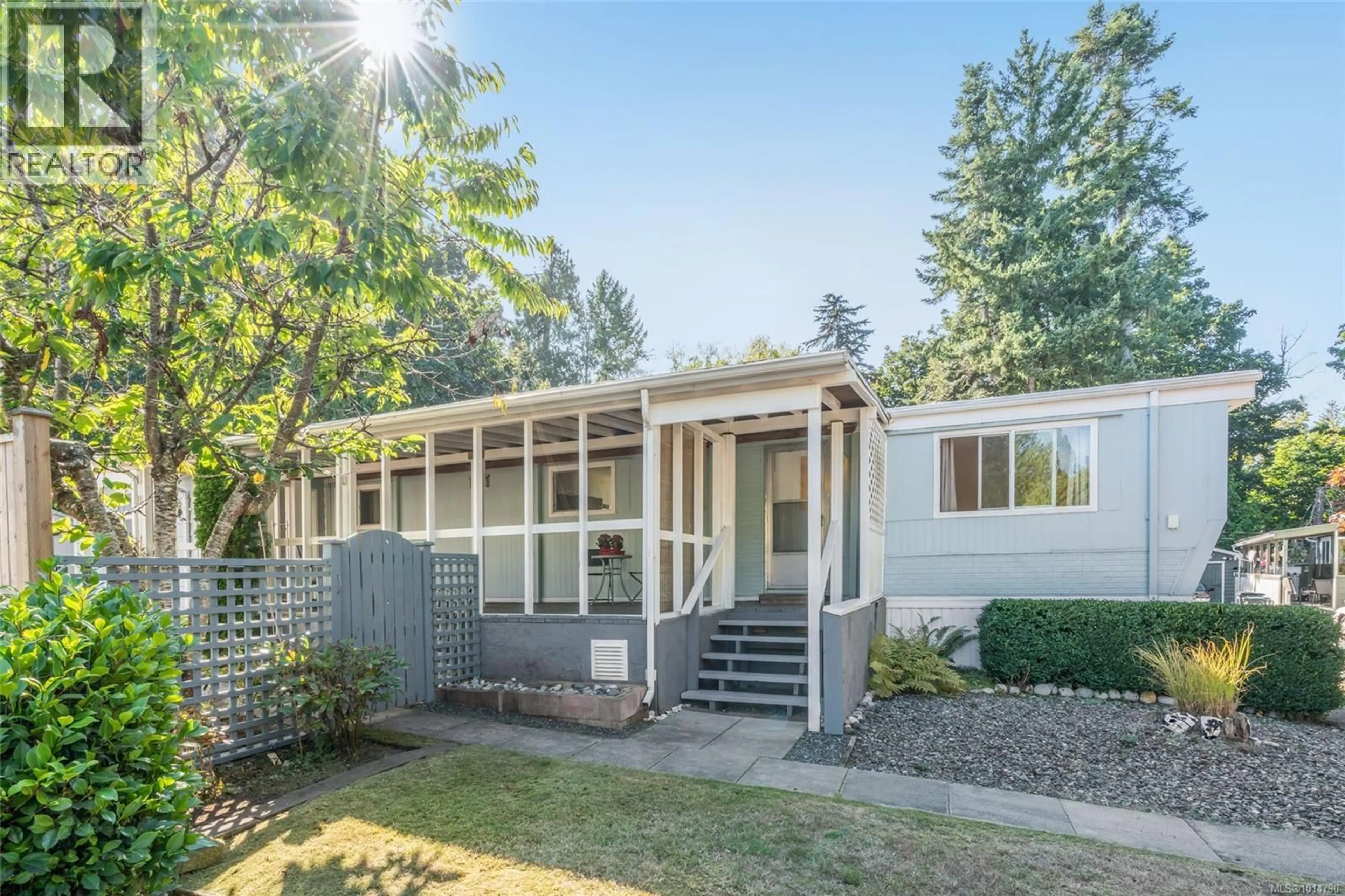 Home with vinyl exterior material, street for 16 - 575 ARBUTUS STREET, Qualicum Beach British Columbia V9K1P2