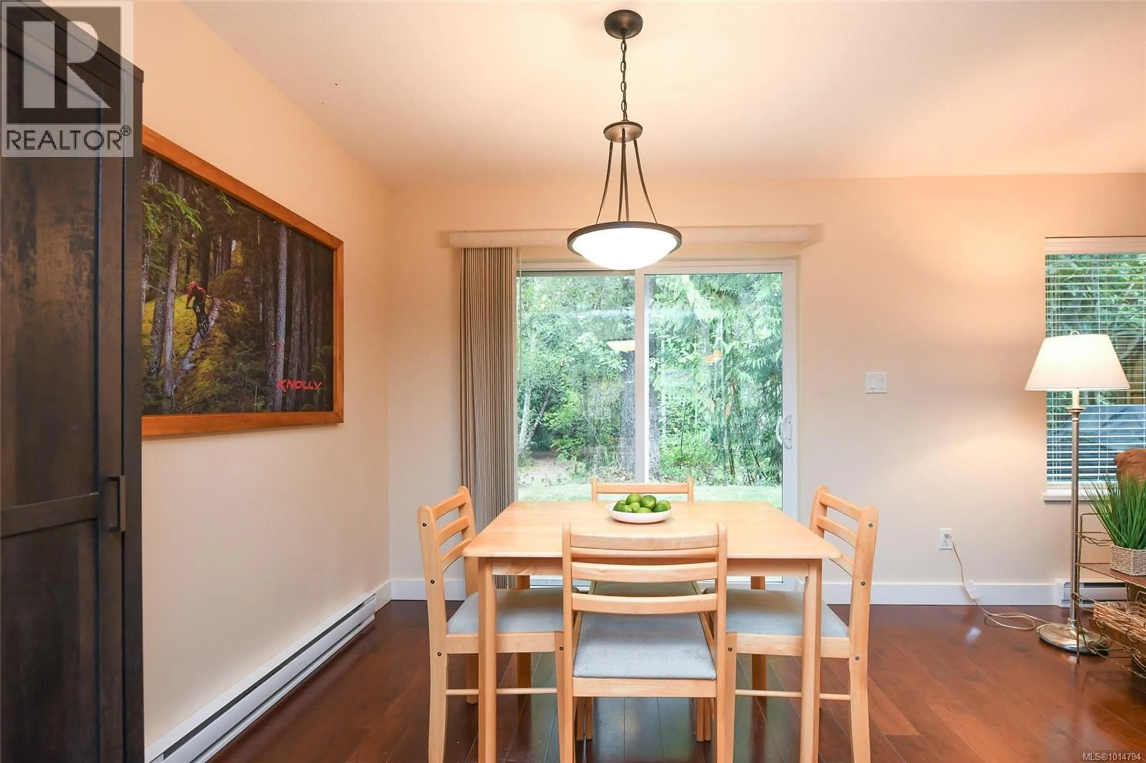 Dining room, wood/laminate floor for 31 - 3400 CONISTON CRESCENT, Cumberland British Columbia V0R1S0