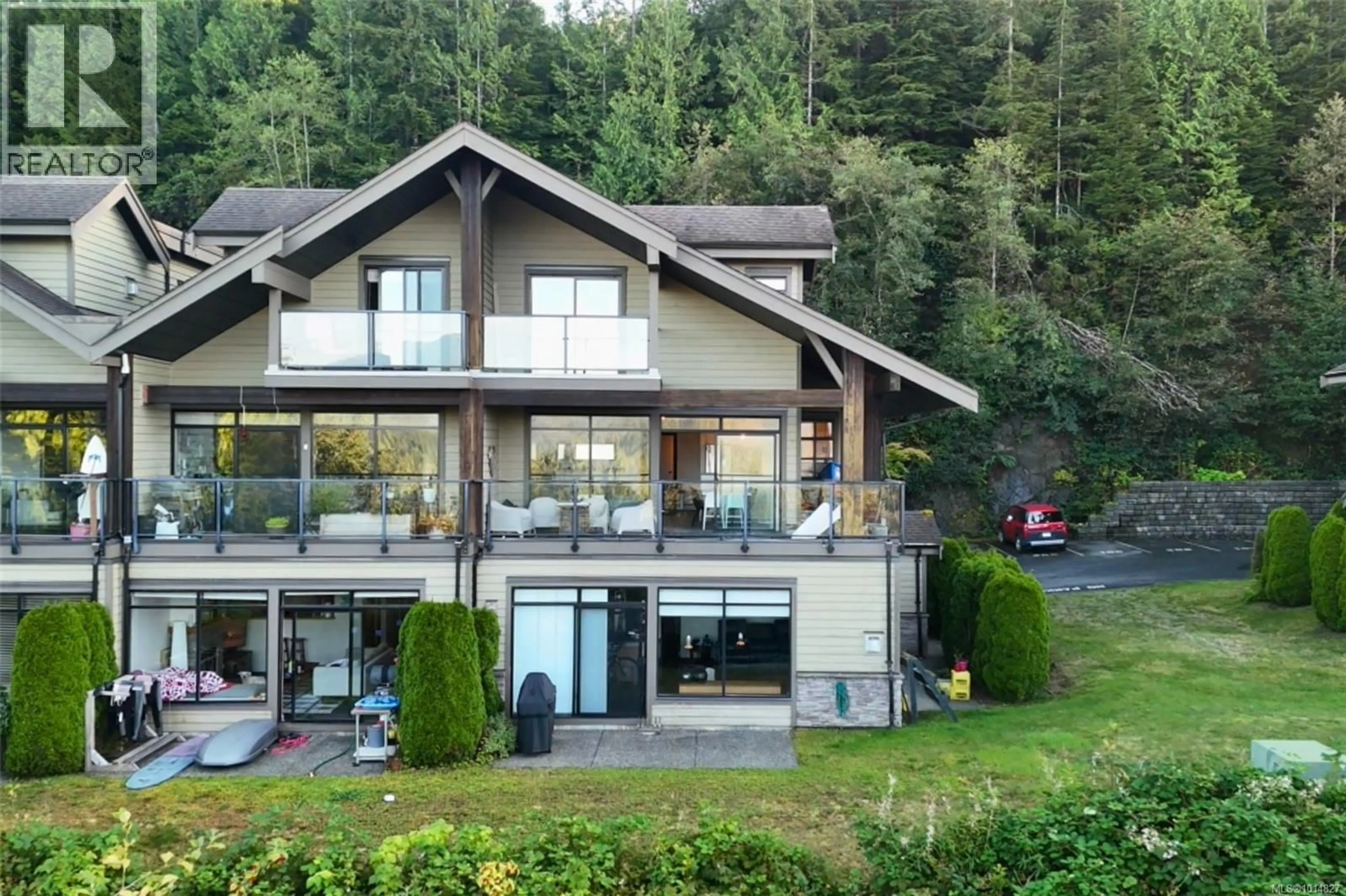 A pic from outside/outdoor area/front of a property/back of a property/a pic from drone, mountain view for 204 - 591 PFEIFFER CRESCENT, Tofino British Columbia V0R2Z0