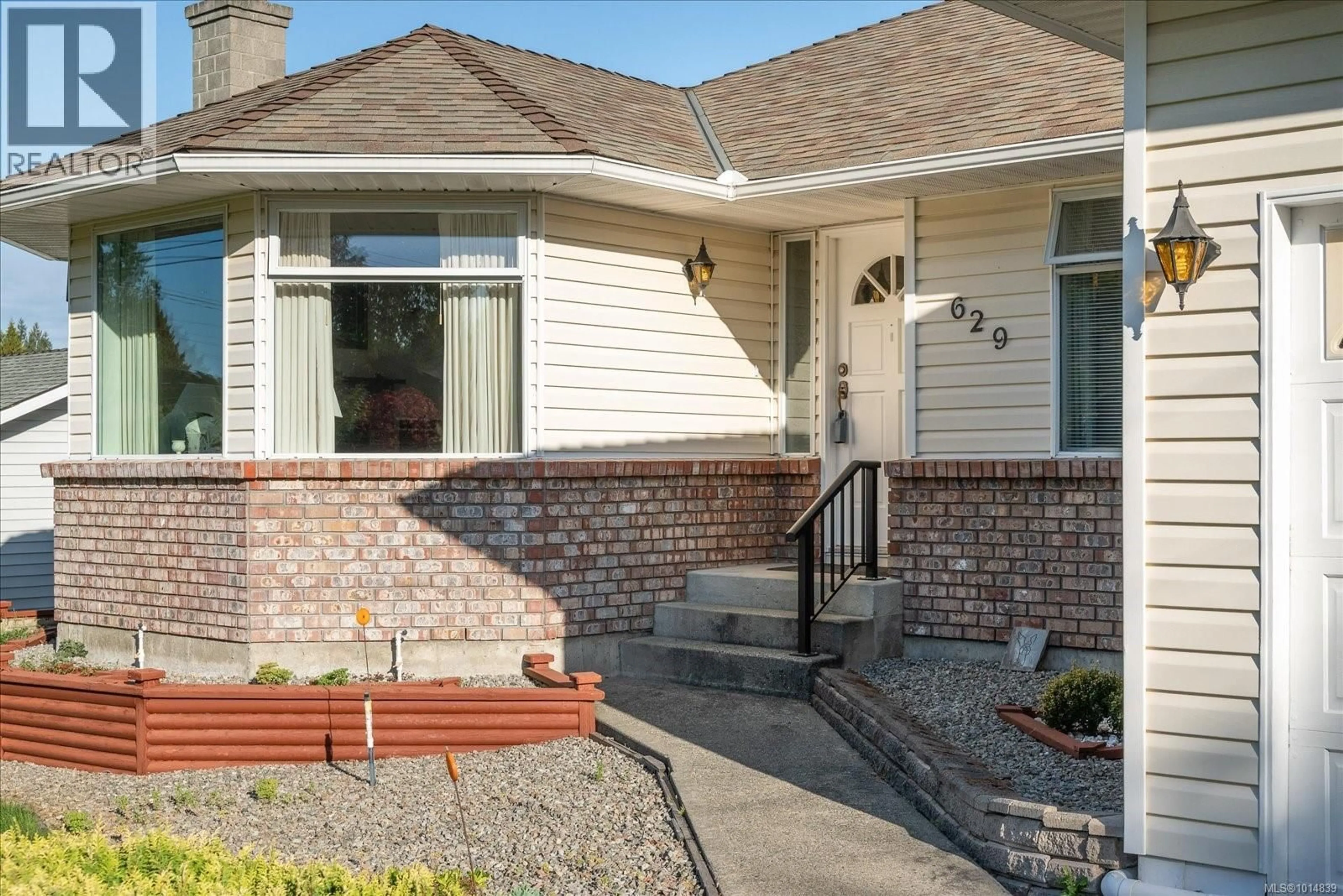 Home with brick exterior material, street for 629 DOGWOOD ROAD, Qualicum Beach British Columbia V9K1A9
