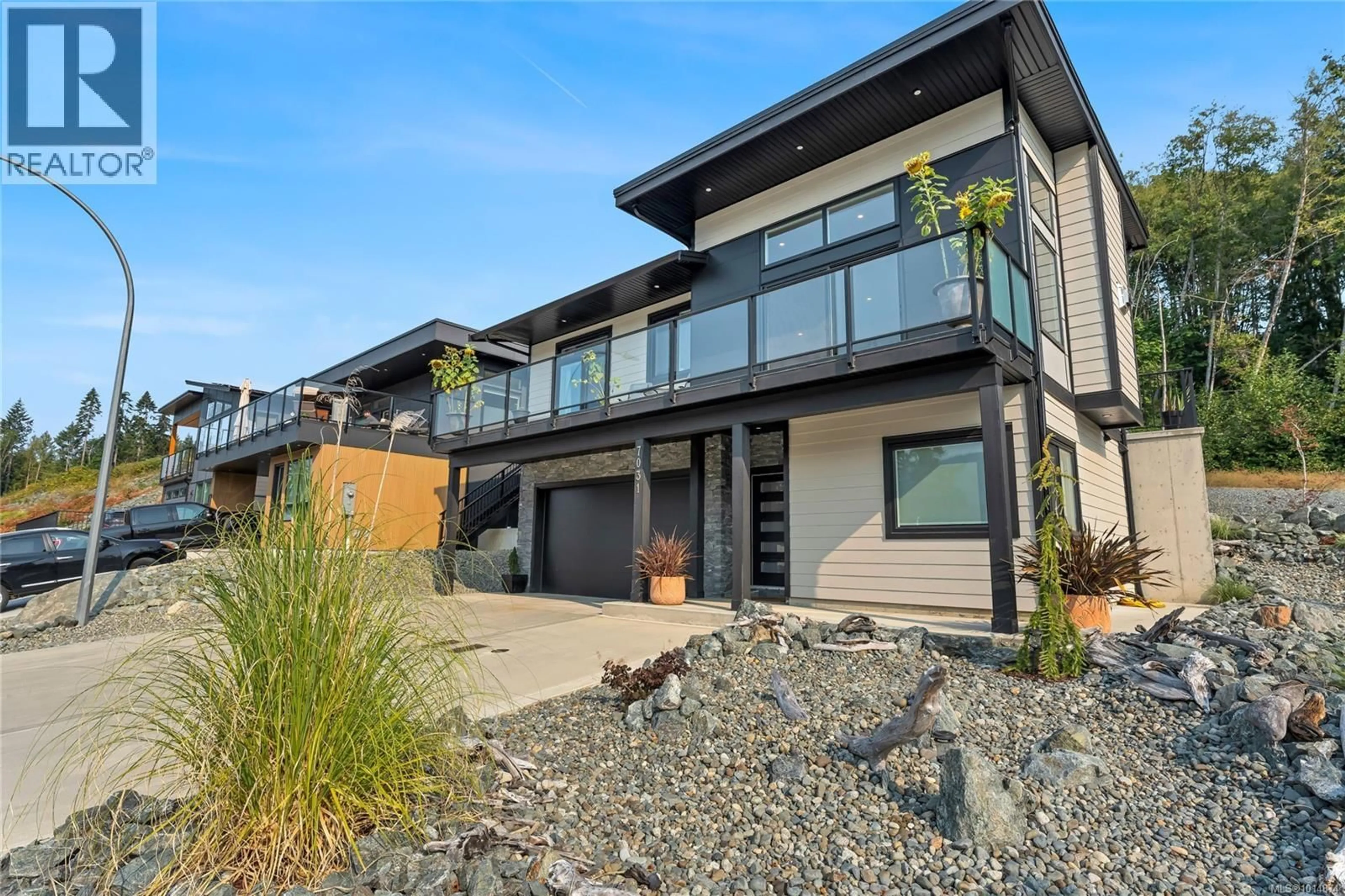 Home with vinyl exterior material, street for 7031 SHA-ELUM DRIVE, Lake Cowichan British Columbia V0R2G0