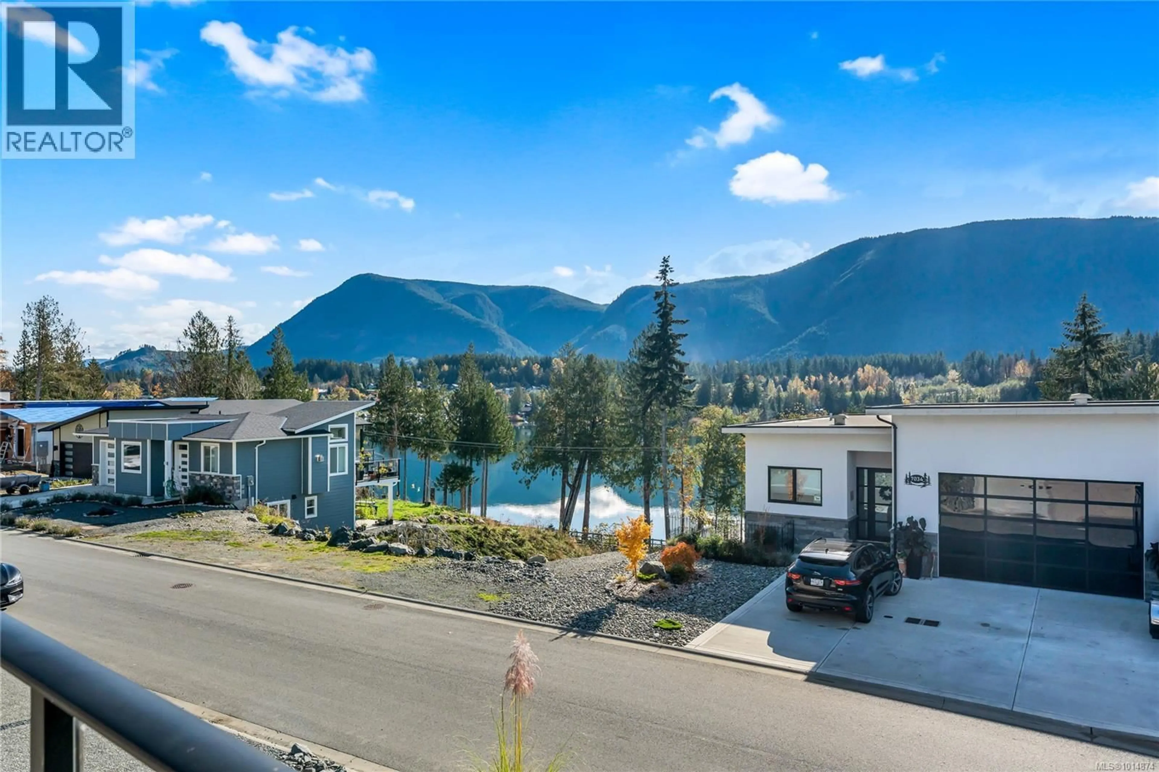 A pic from outside/outdoor area/front of a property/back of a property/a pic from drone, mountain view for 7031 SHA-ELUM DRIVE, Lake Cowichan British Columbia V0R2G0