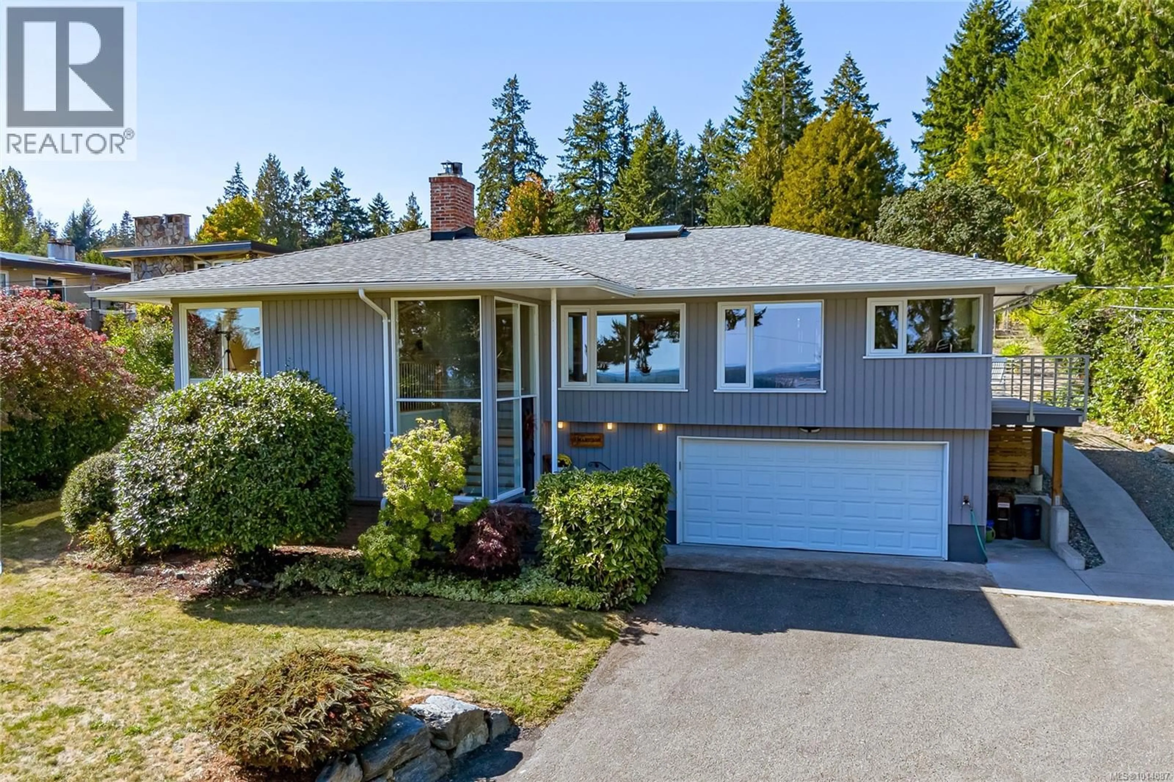 Home with vinyl exterior material, street for 8650 EMARD TERRACE, North Saanich British Columbia V8L1K4