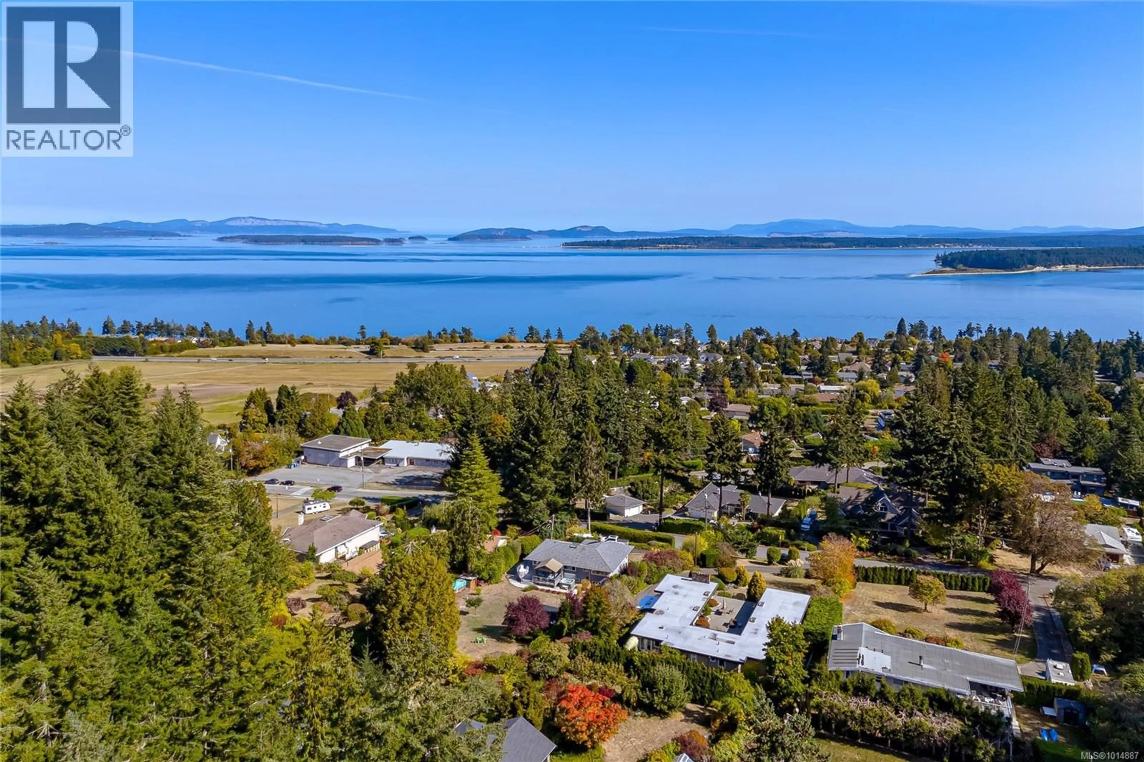 A pic from outside/outdoor area/front of a property/back of a property/a pic from drone, water/lake/river/ocean view for 8650 EMARD TERRACE, North Saanich British Columbia V8L1K4