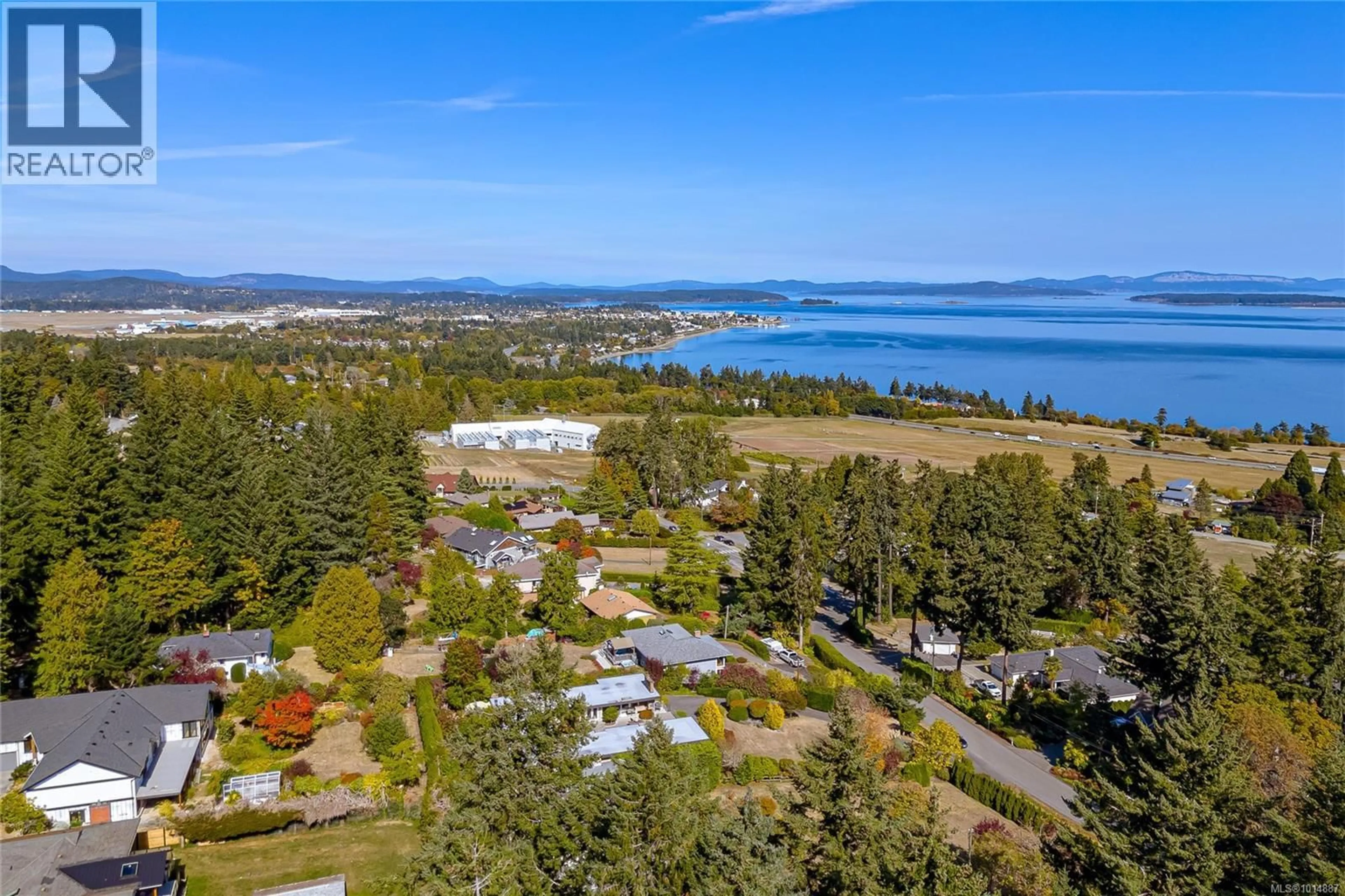 A pic from outside/outdoor area/front of a property/back of a property/a pic from drone, water/lake/river/ocean view for 8650 EMARD TERRACE, North Saanich British Columbia V8L1K4