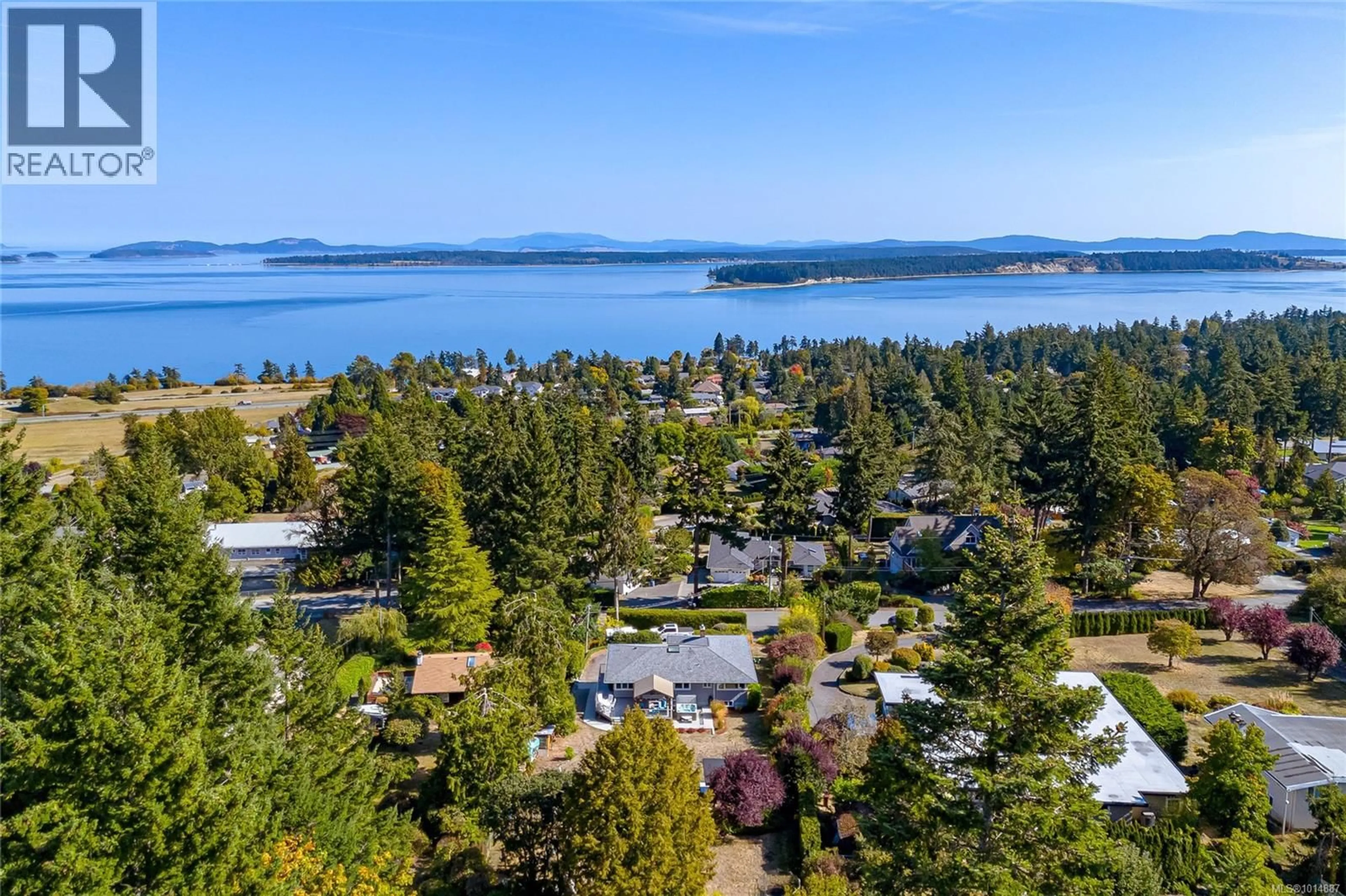 A pic from outside/outdoor area/front of a property/back of a property/a pic from drone, water/lake/river/ocean view for 8650 EMARD TERRACE, North Saanich British Columbia V8L1K4
