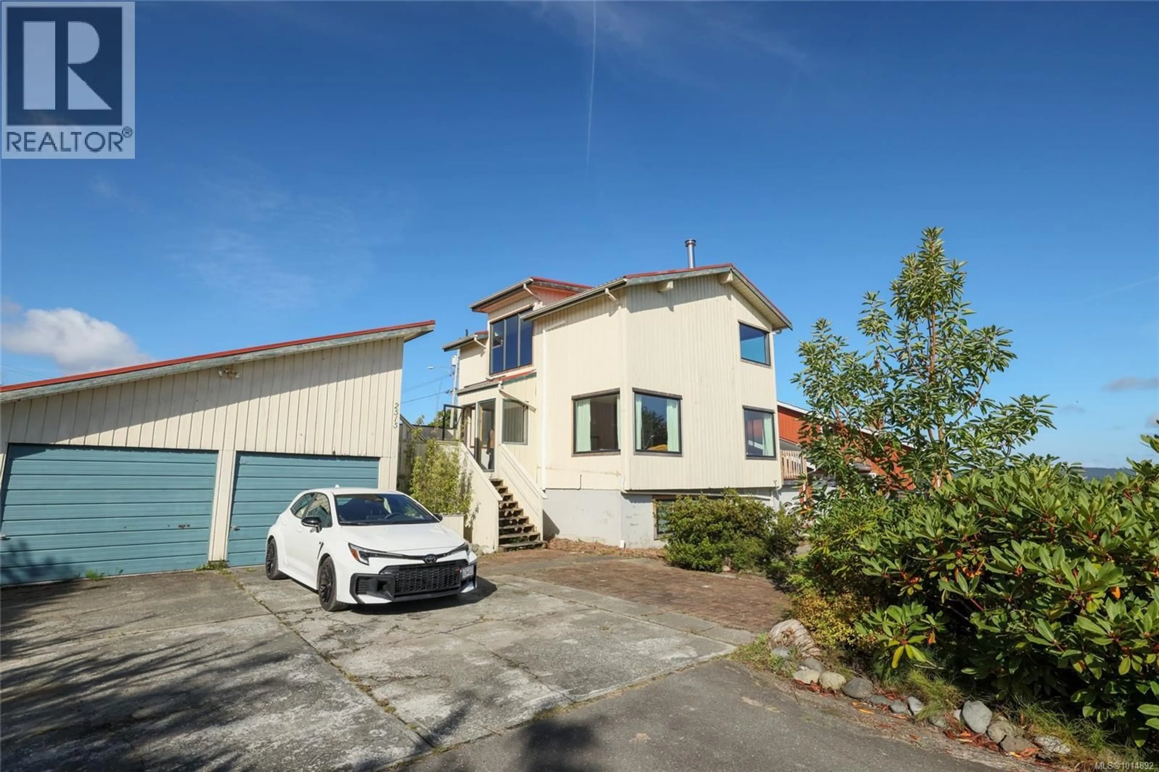 A pic from outside/outdoor area/front of a property/back of a property/a pic from drone, street for 2515 HADDINGTON CRESCENT, Port McNeill British Columbia V0N2R0