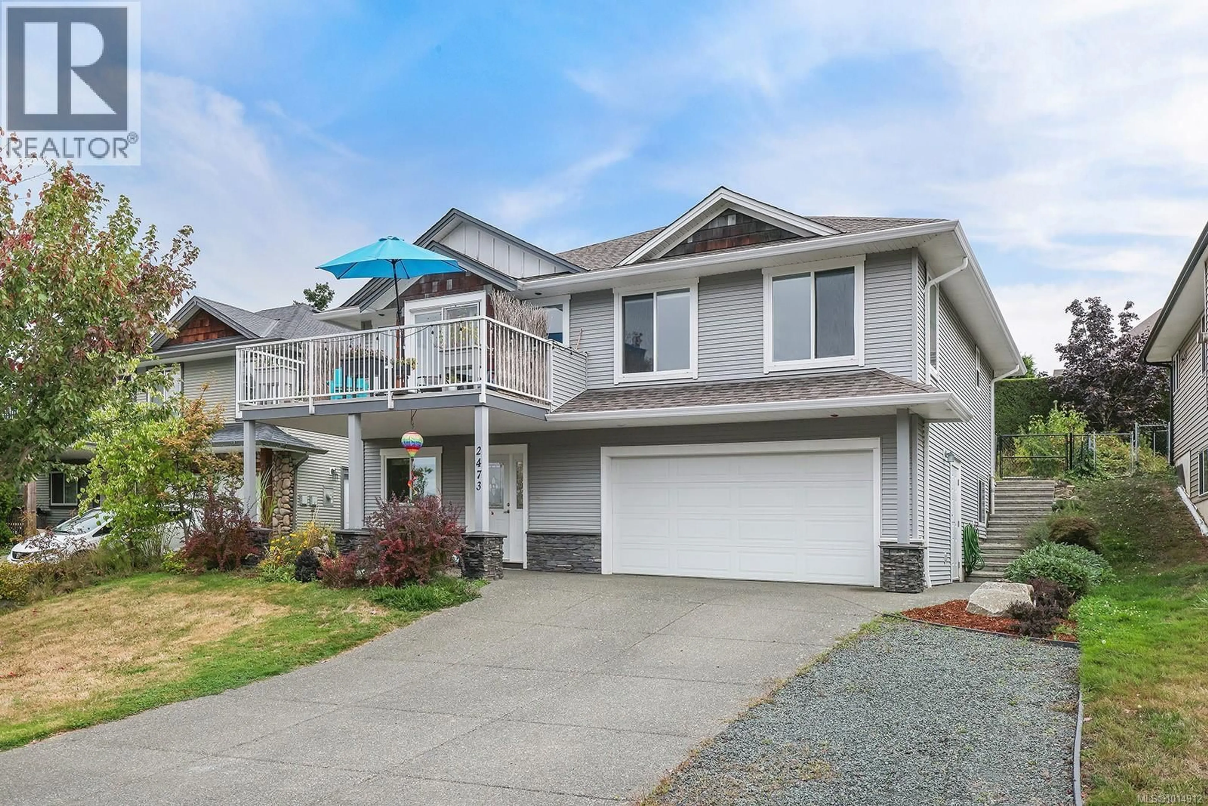 Home with vinyl exterior material, street for 2473 AVRO ARROW DRIVE, Comox British Columbia V9M0A6