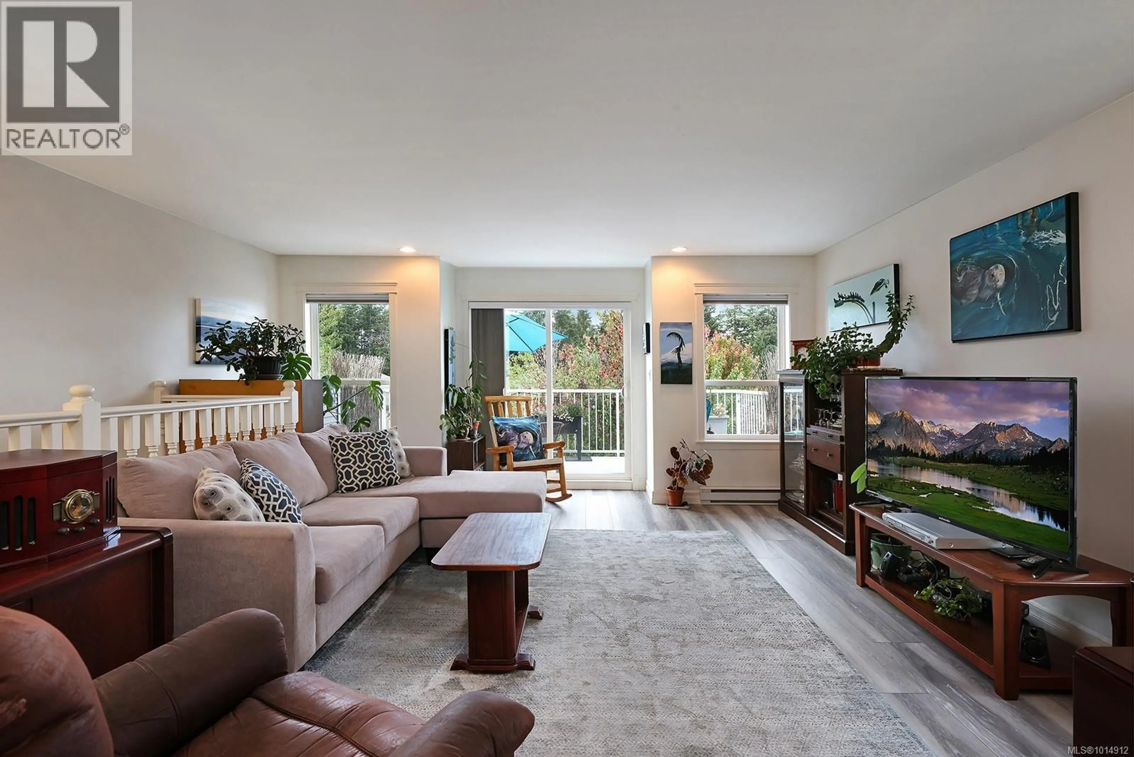 Living room with furniture, unknown for 2473 AVRO ARROW DRIVE, Comox British Columbia V9M0A6